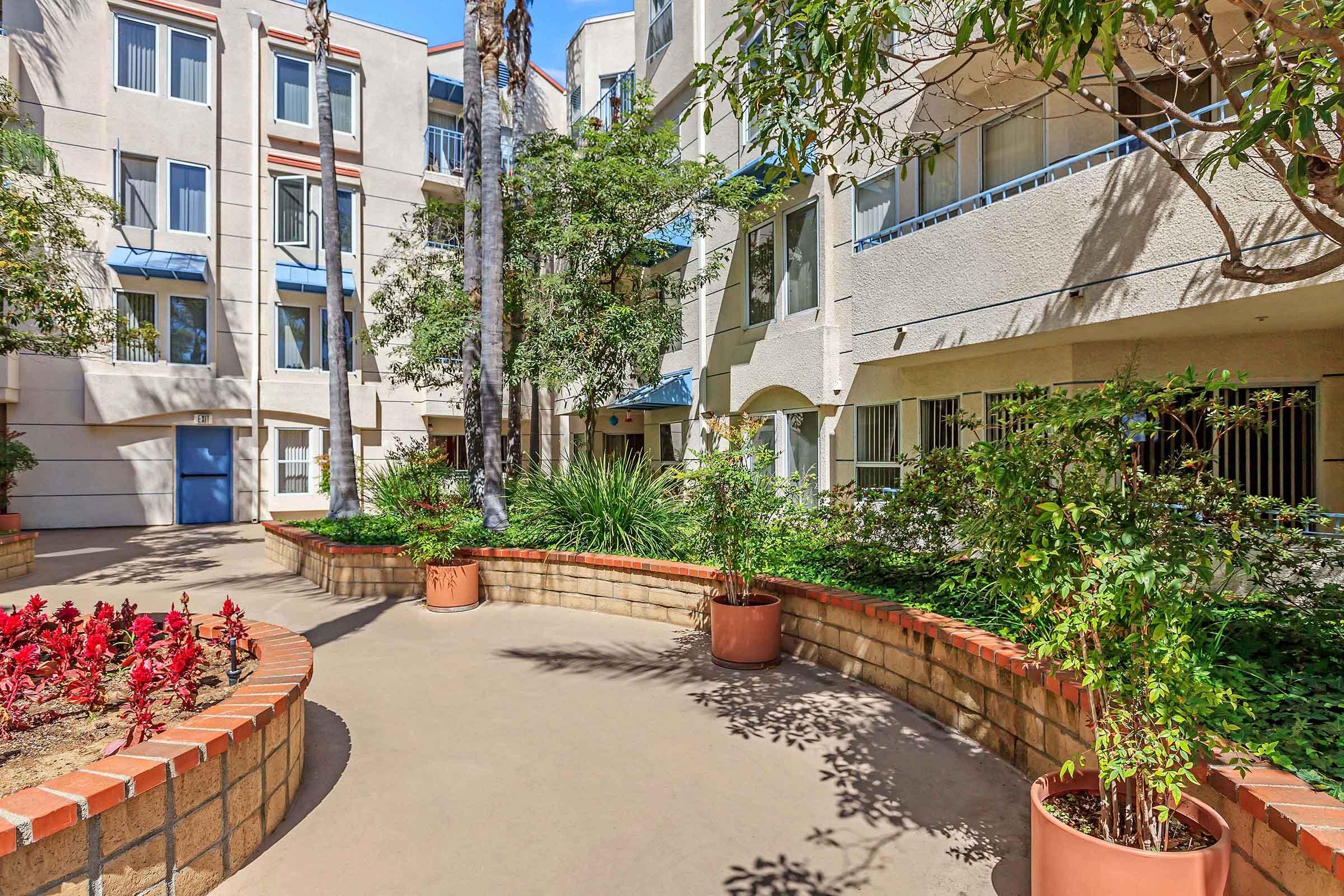 a garden in front of a building