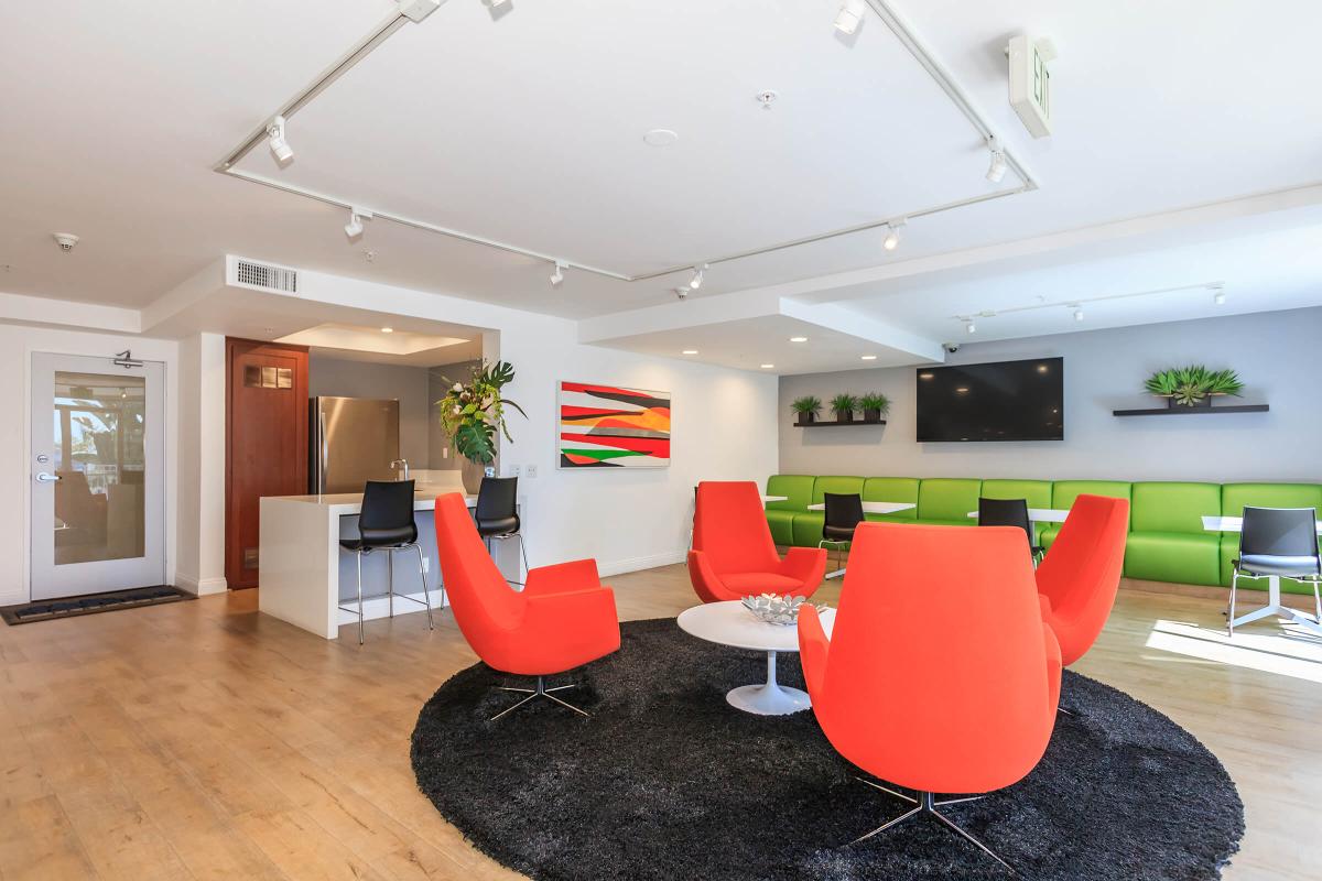 a large red chair in a room