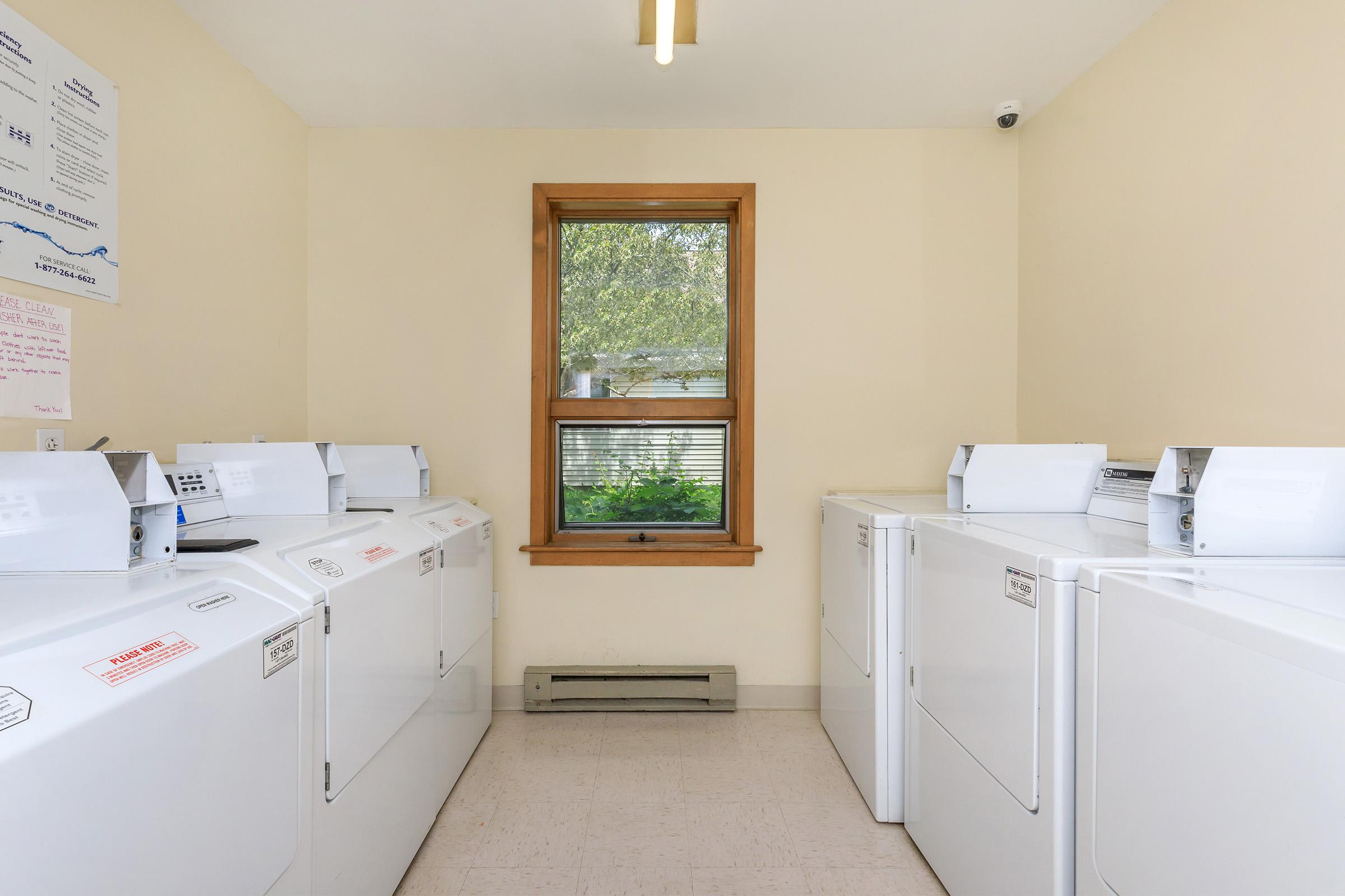 a kitchen with a sink and a refrigerator