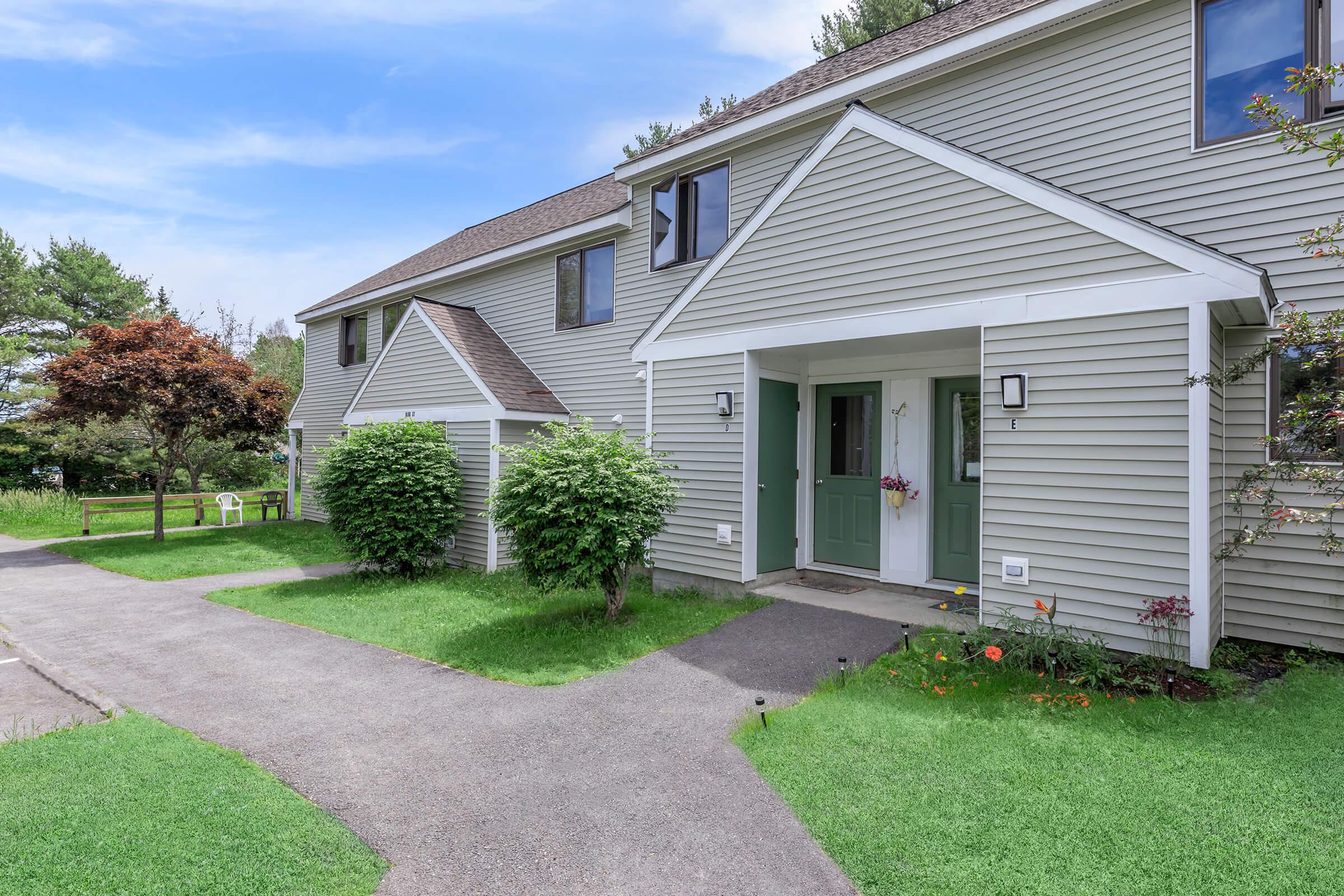 a large lawn in front of a house