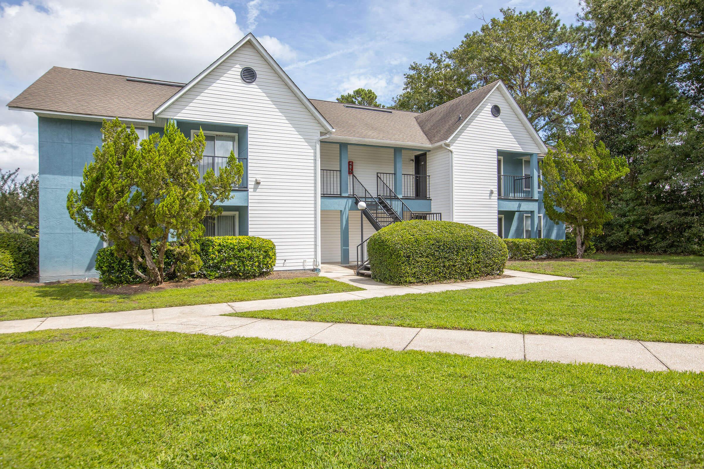 a large lawn in front of a house