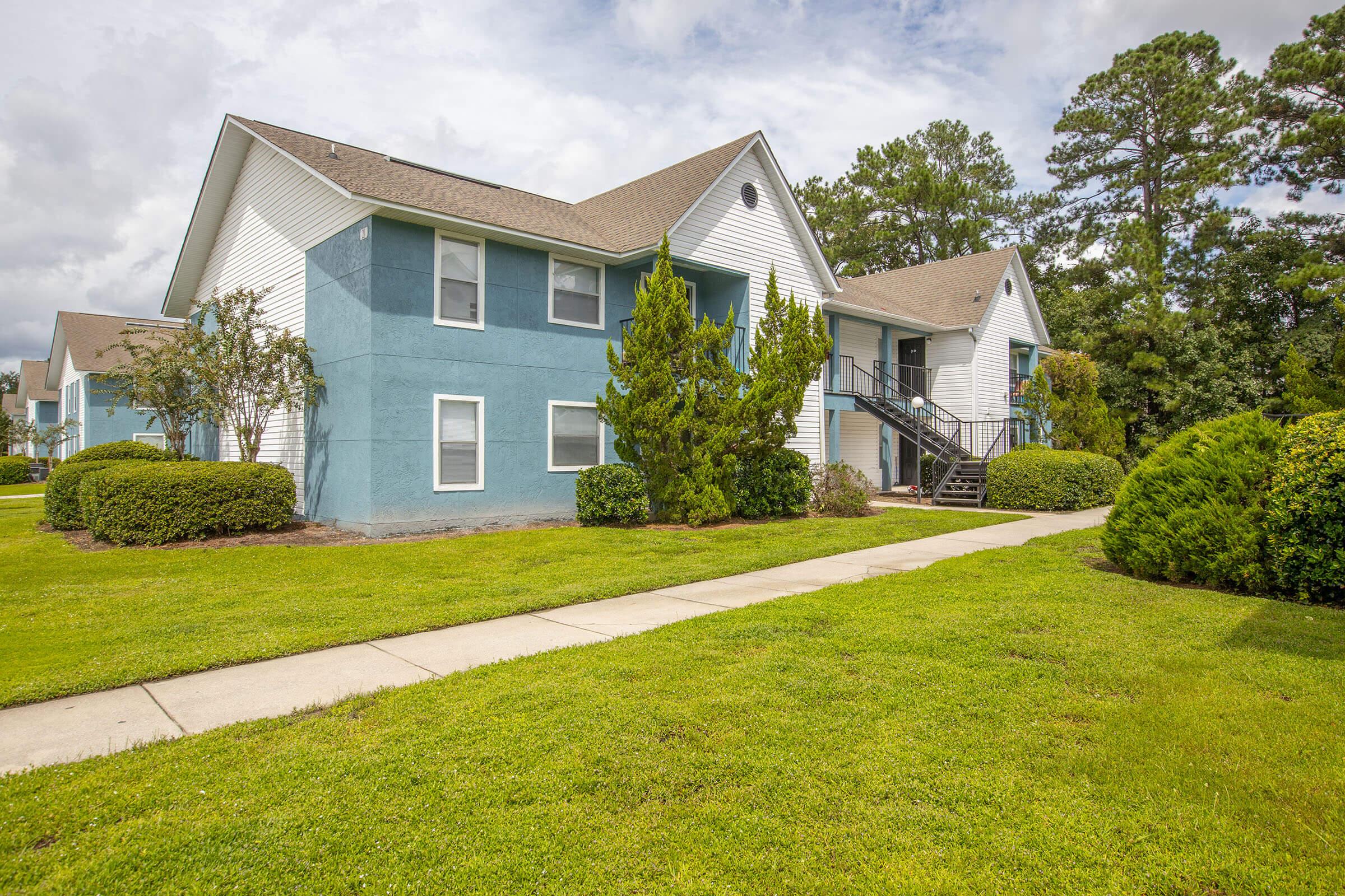 a large lawn in front of a house