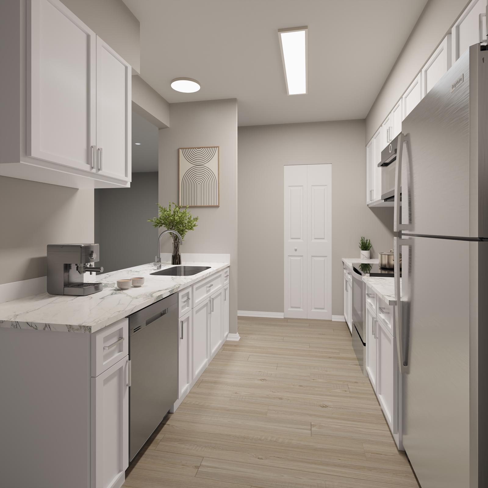 Modern kitchen featuring white cabinets, marble countertops, stainless steel appliances, and wooden flooring. A sink is positioned beneath a window, with a small plant on the counter. Artwork hangs on the wall, adding a decorative touch to the neutral-toned space.
