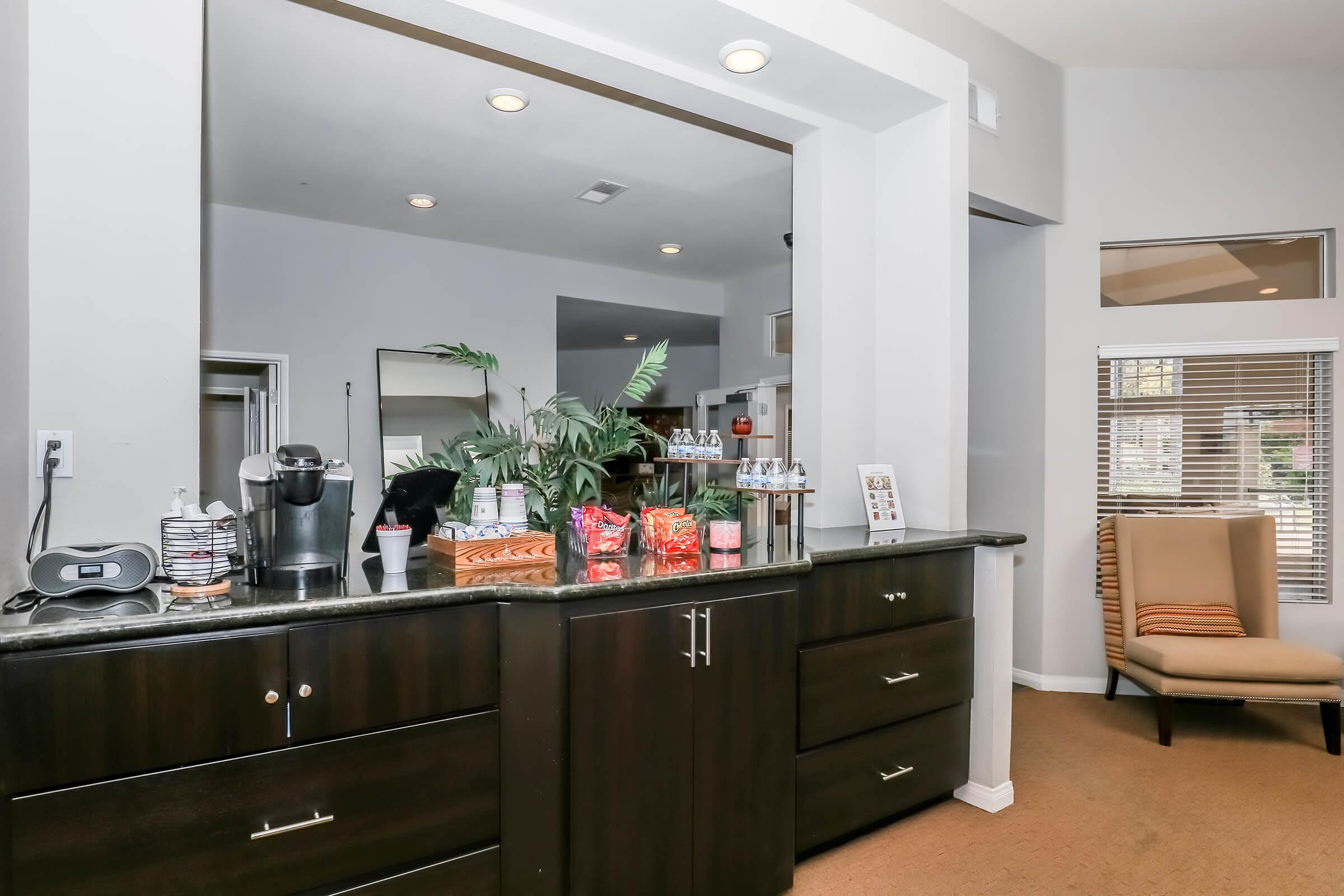 a kitchen with a sink and a window