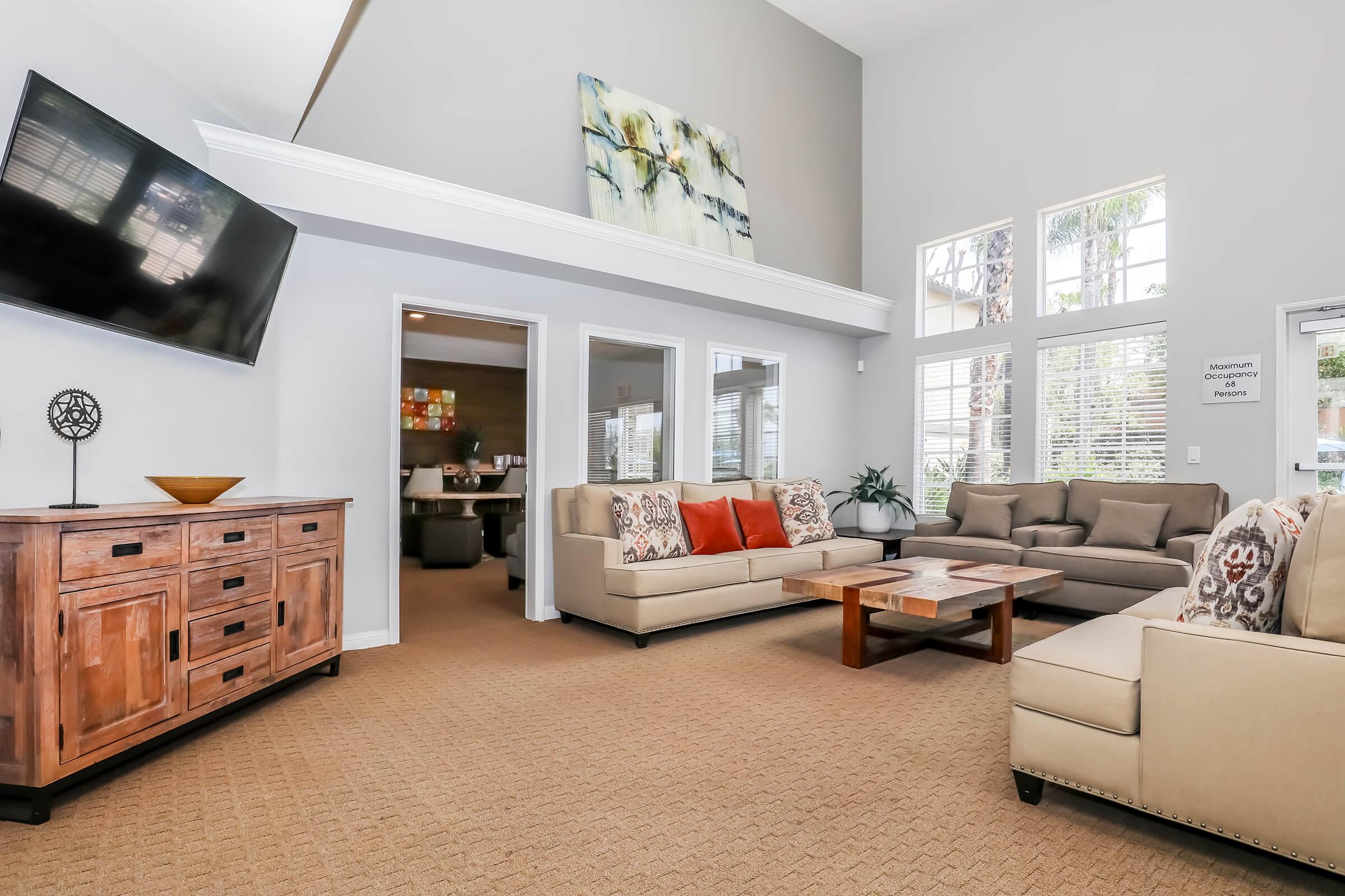 a living room filled with lots of furniture