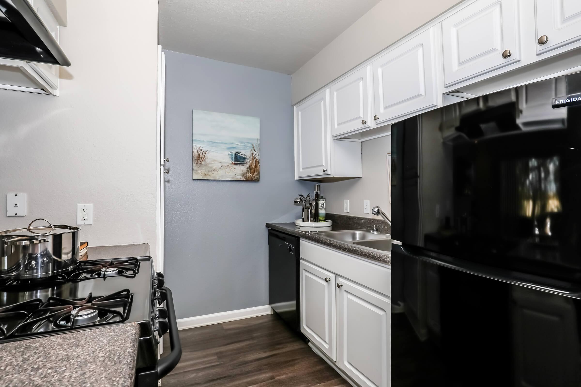 a modern kitchen with stainless steel appliances