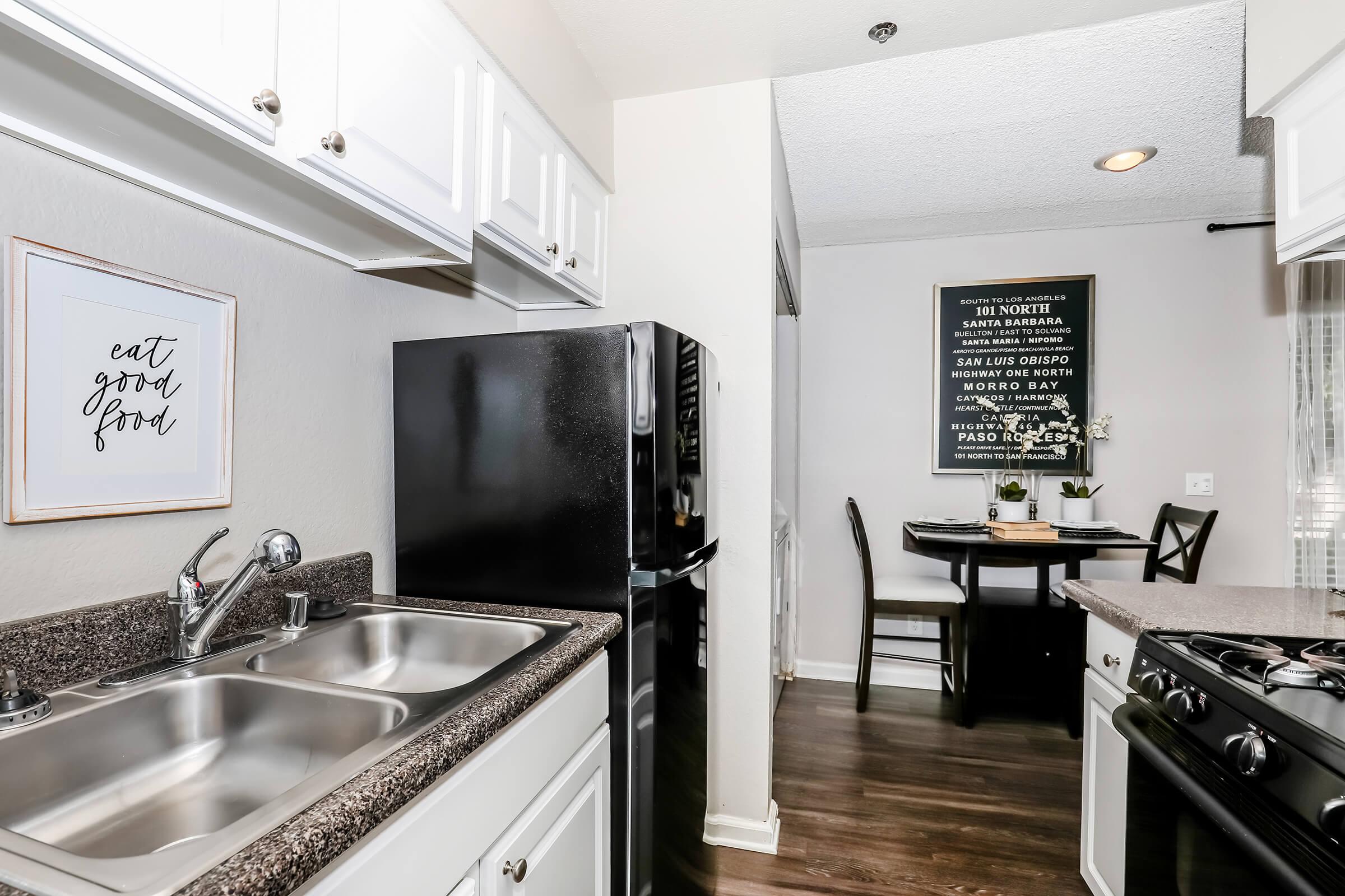 a modern kitchen with stainless steel appliances