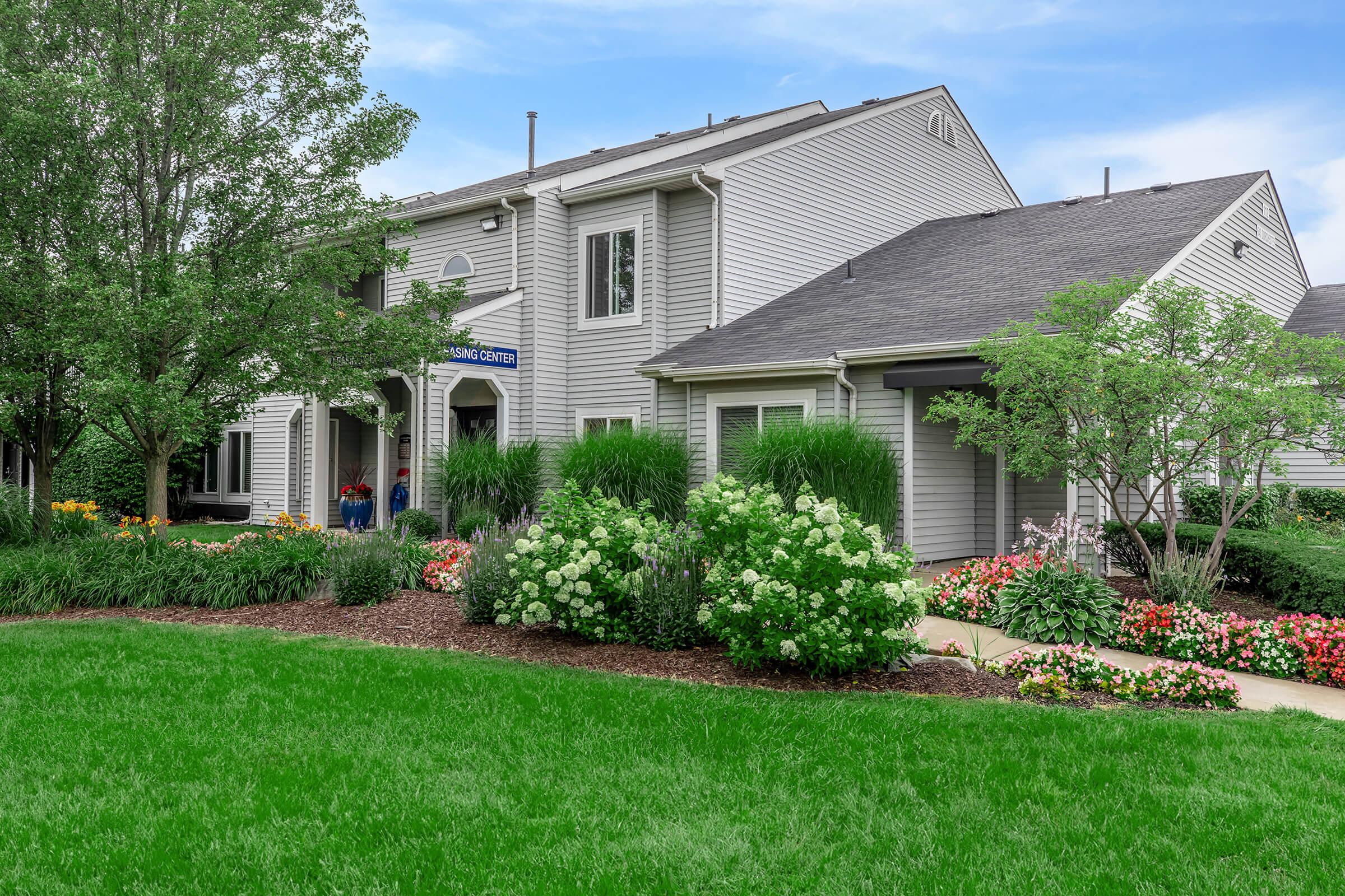 a large lawn in front of a house