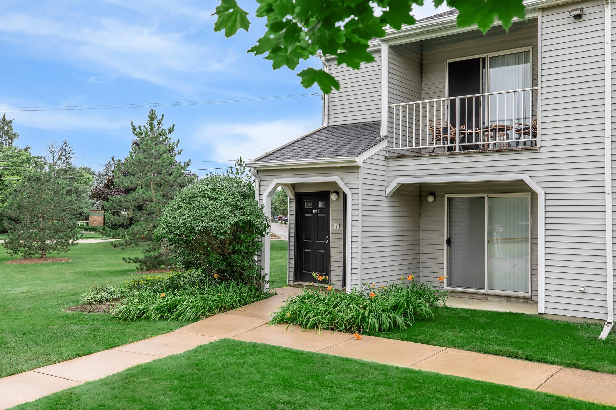 a large lawn in front of a house