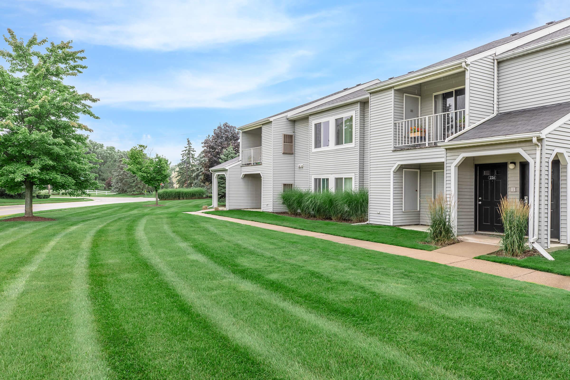 a large lawn in front of a house