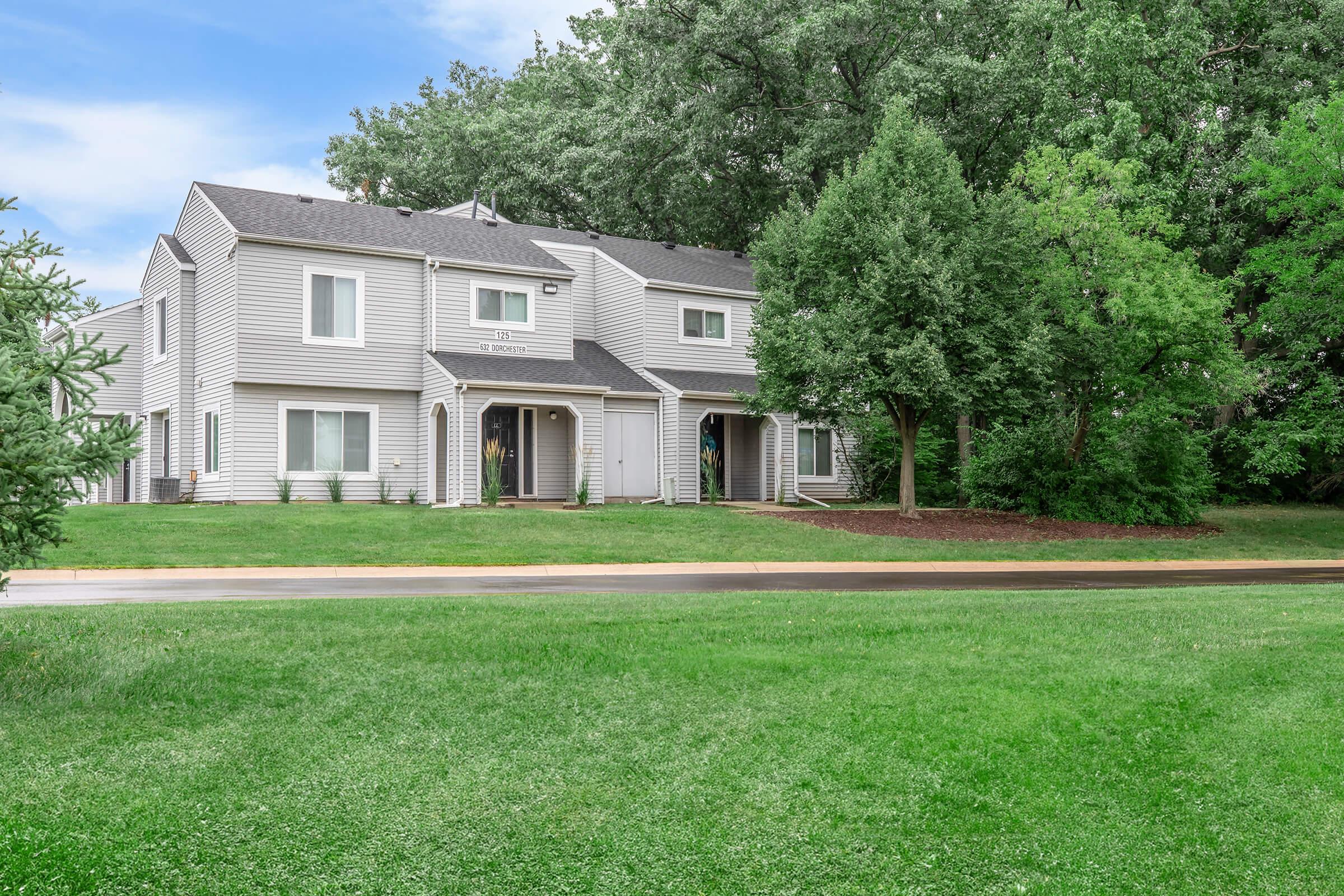 a house with a grass field