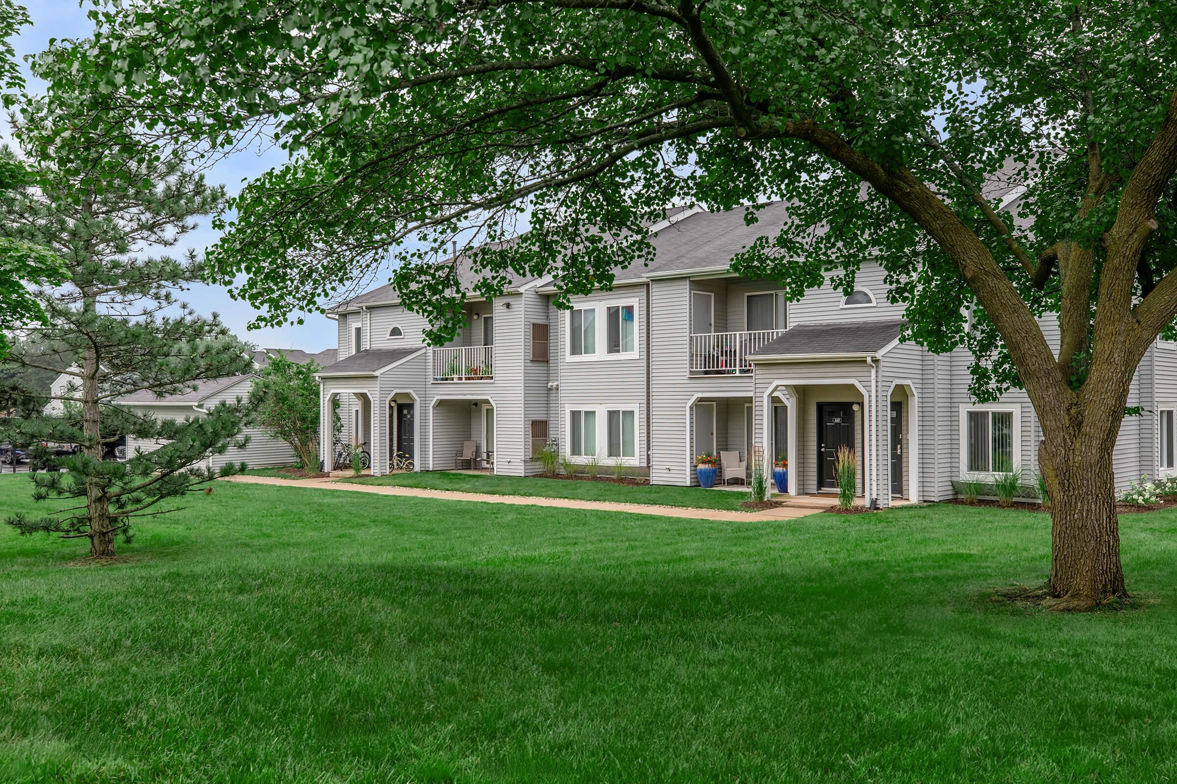 a large lawn in front of a house