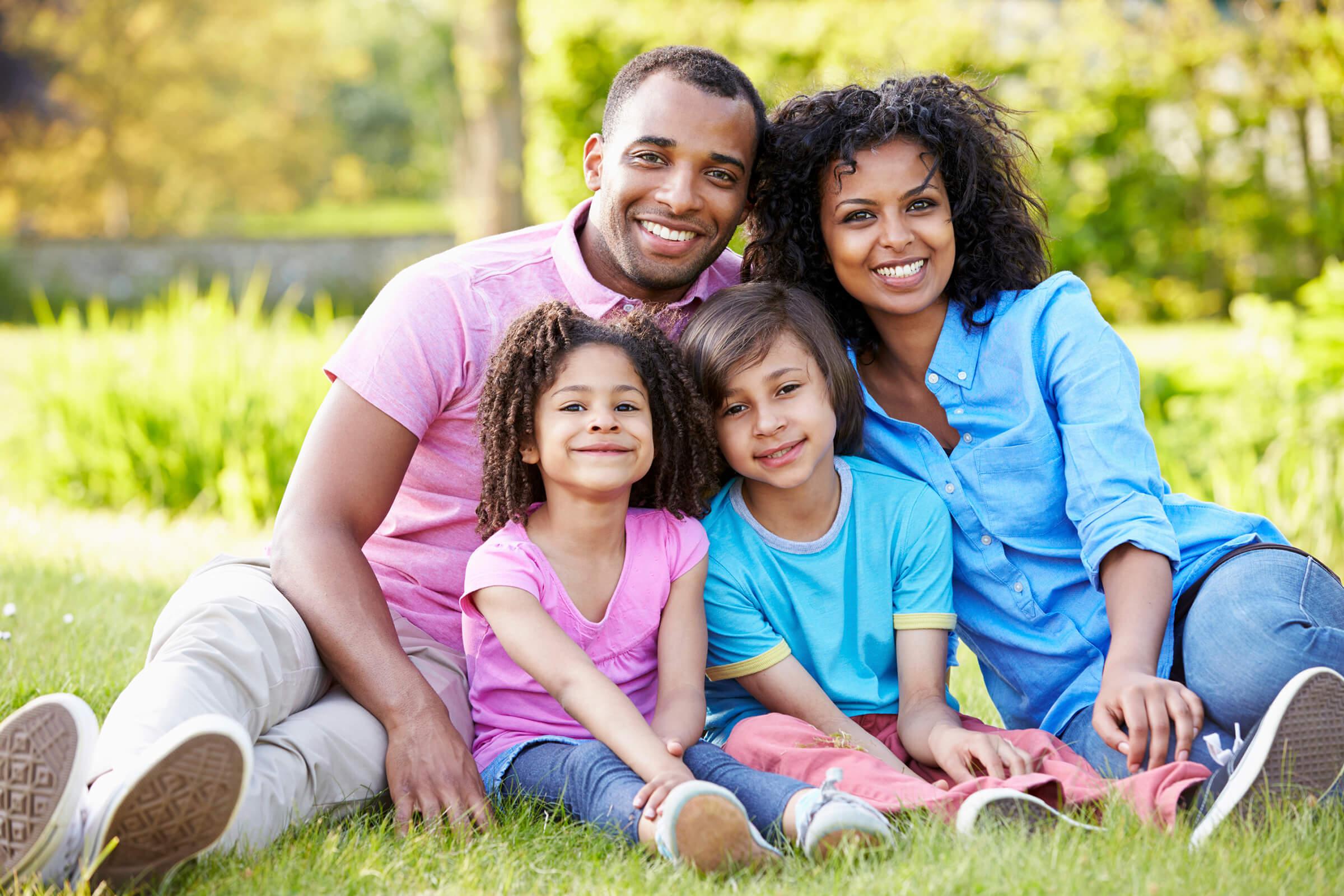 African American Family Sitting In Garden iStock_31635434_LARGE.jpg