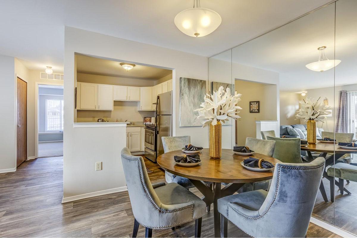 a kitchen with a dining room table