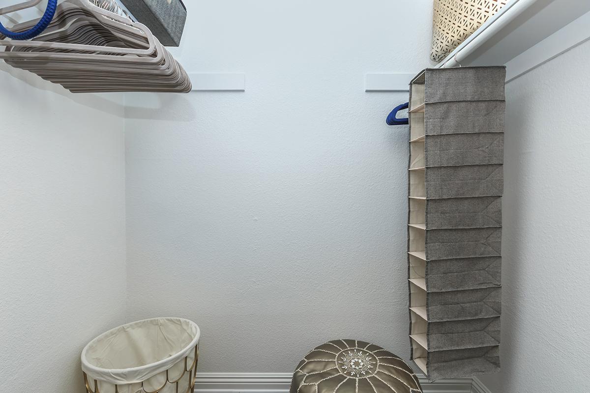 Walk-in closet with a shoe divider