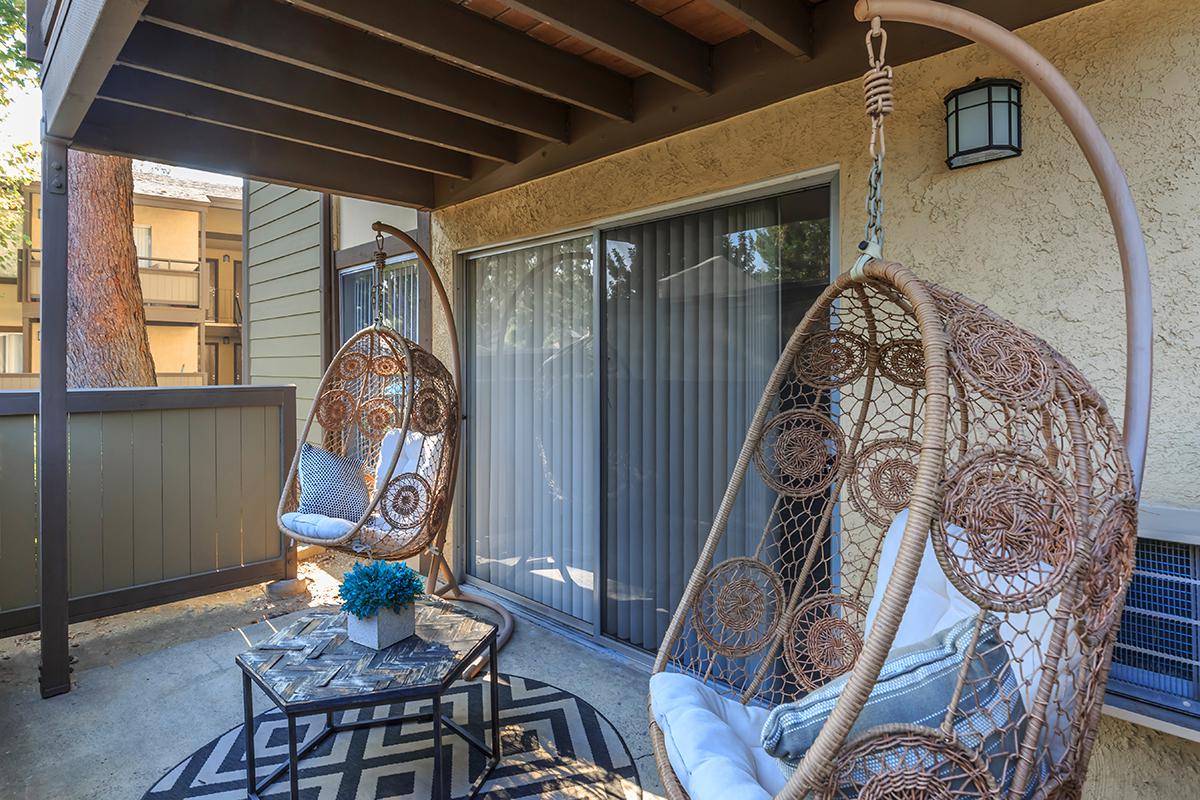 Patio with swinging chairs