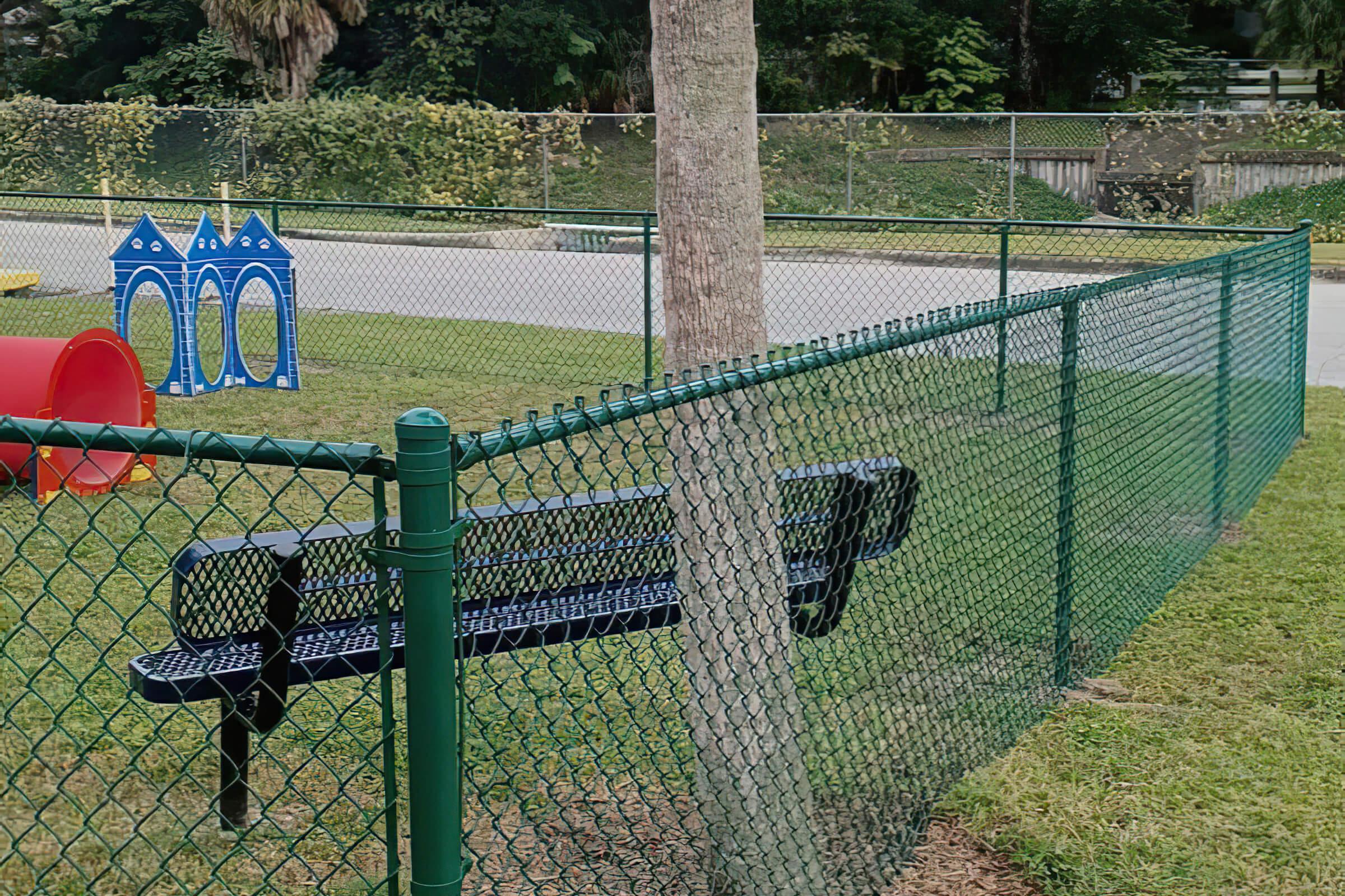 a close up of a green fence