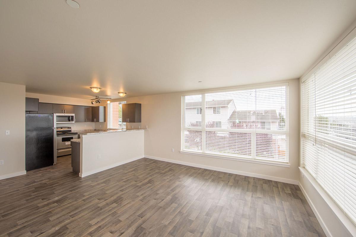 a kitchen with a wood floor