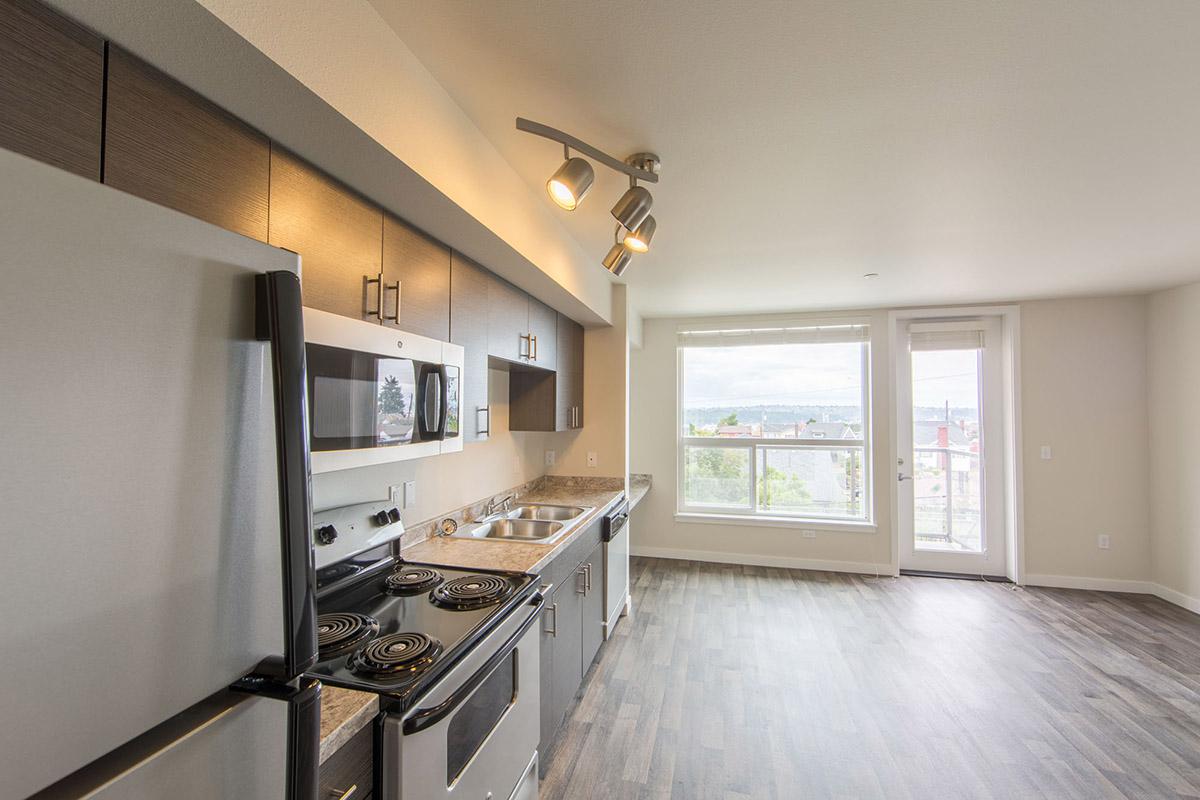 a large kitchen with stainless steel appliances