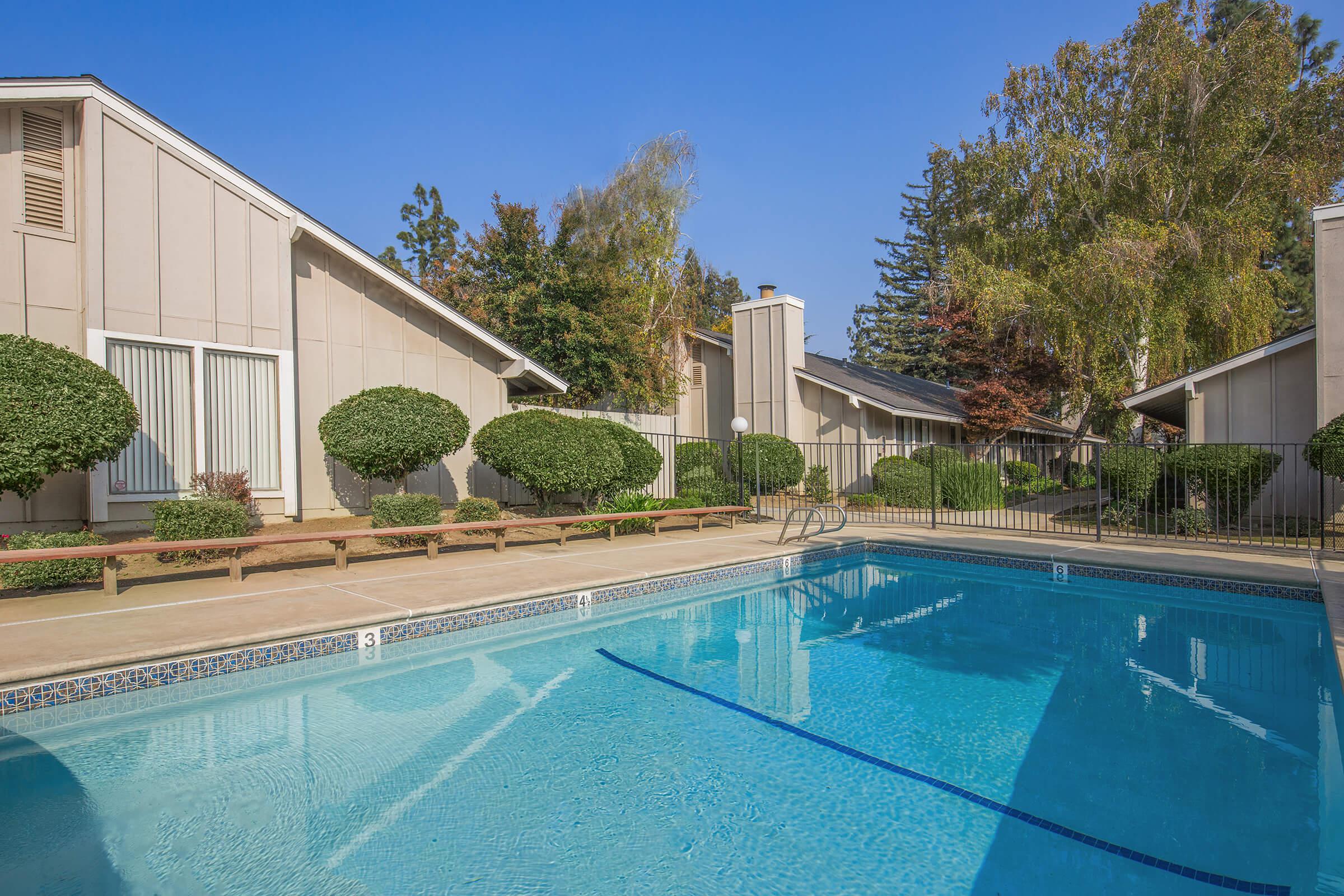 a pool next to a building