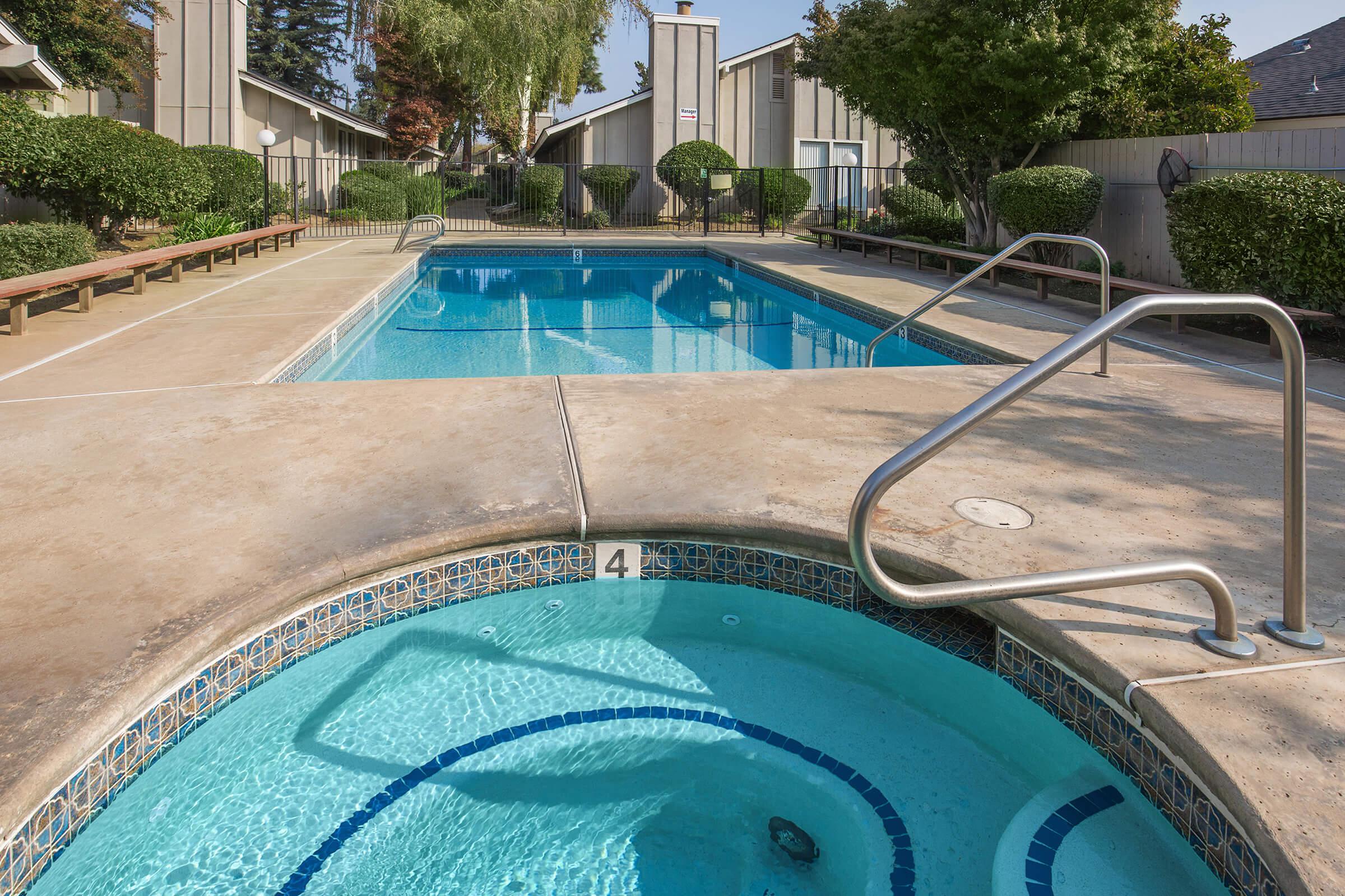 a pool next to a building