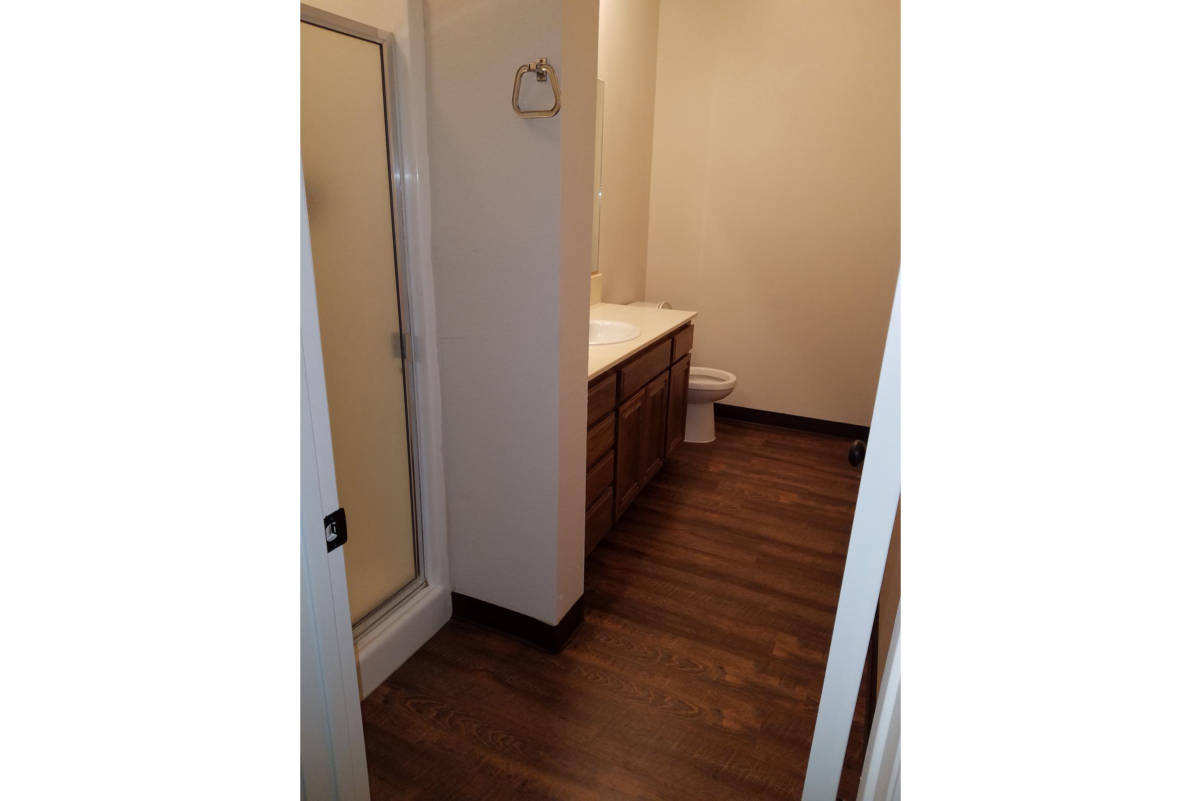 a white refrigerator freezer sitting in a room