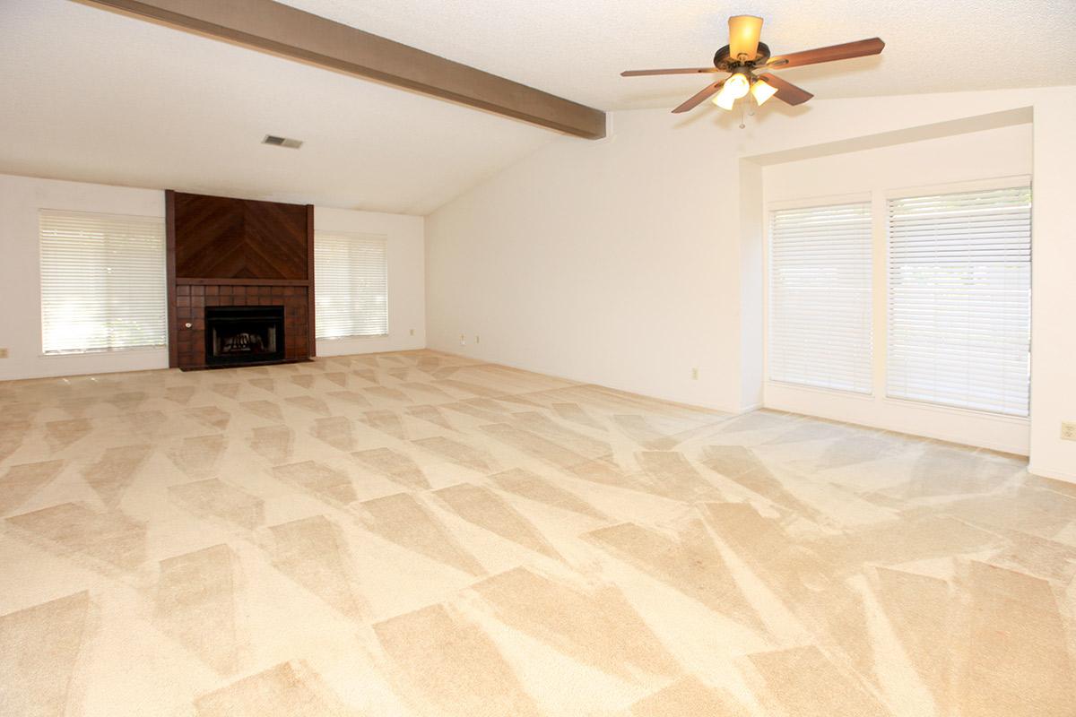 a large white bed in a room