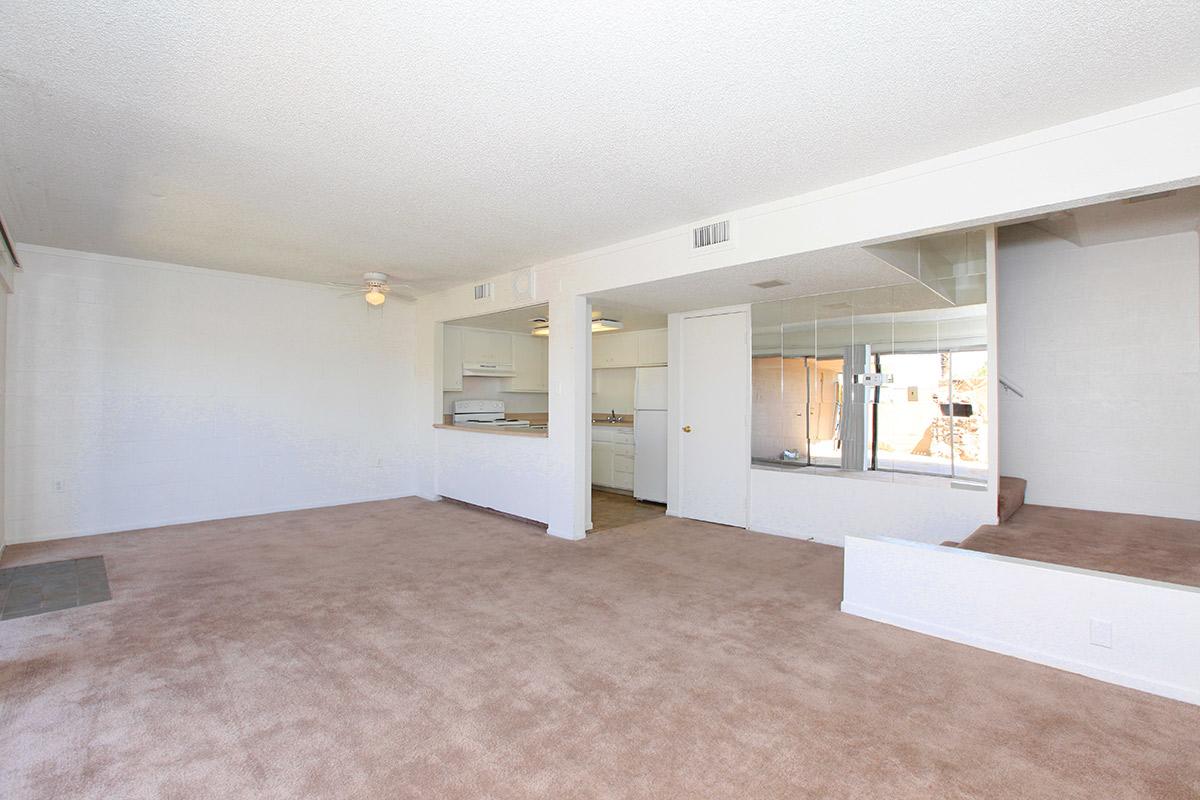 SPACIOUS LIVING ROOM AT THE PALMS APARTMENTS IN LAS VEGAS
