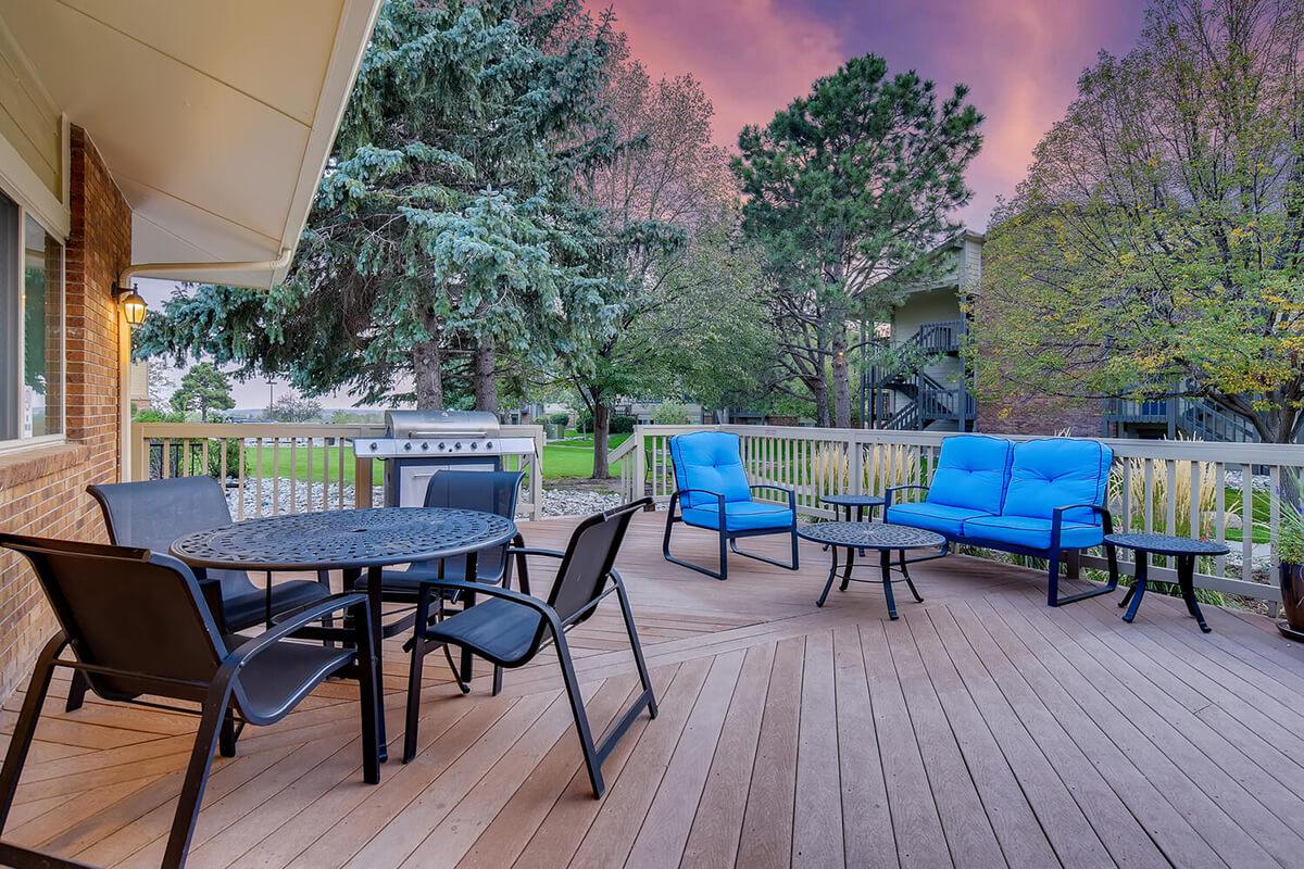 a chair sitting in front of a picnic table