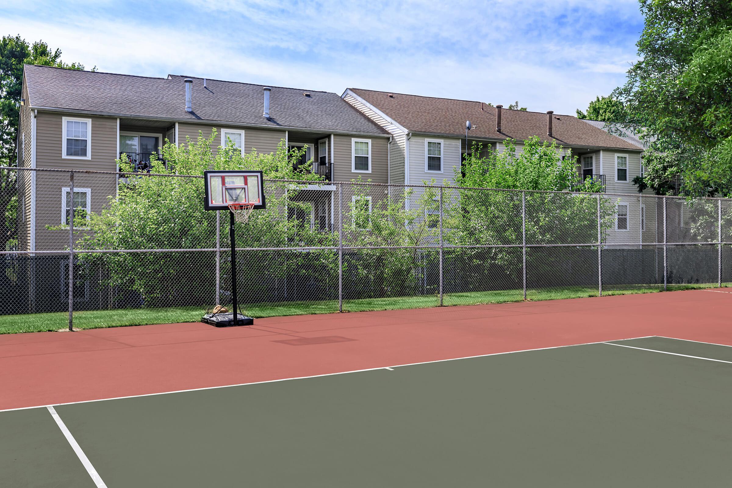 a house with a racket on a court