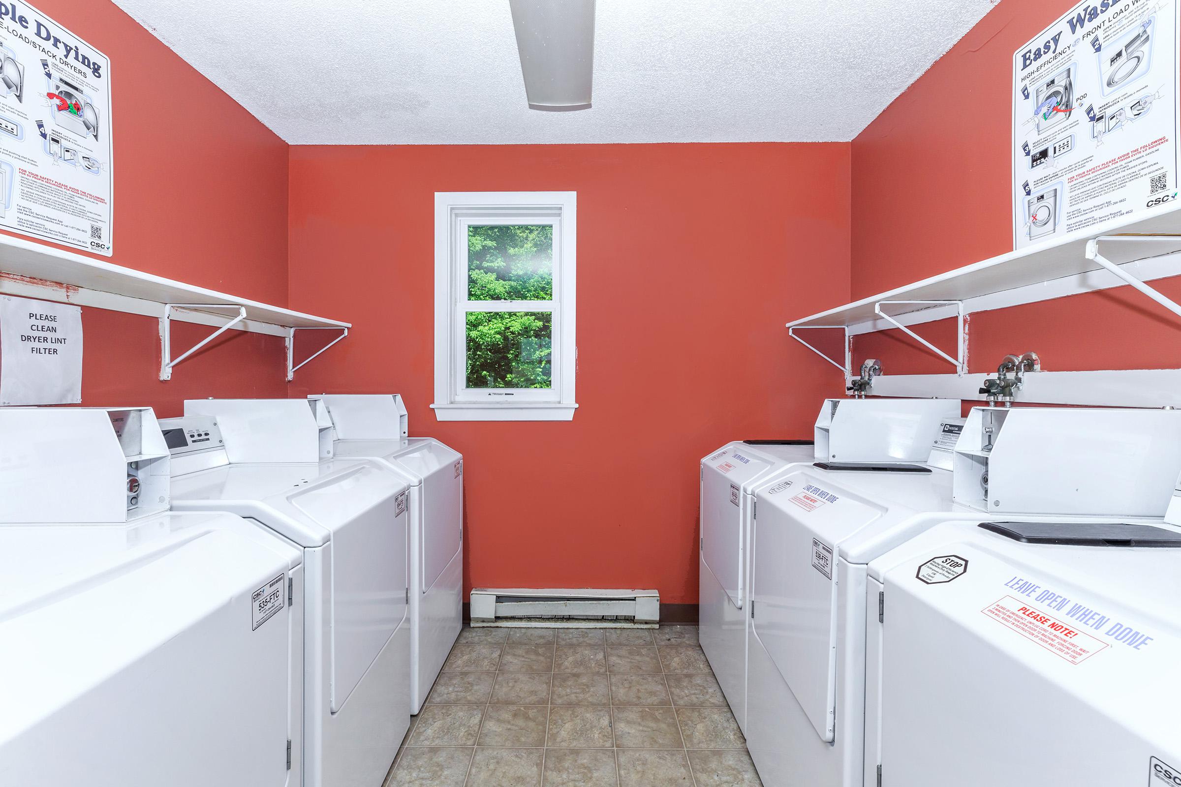 a white refrigerator freezer sitting inside of a kitchen