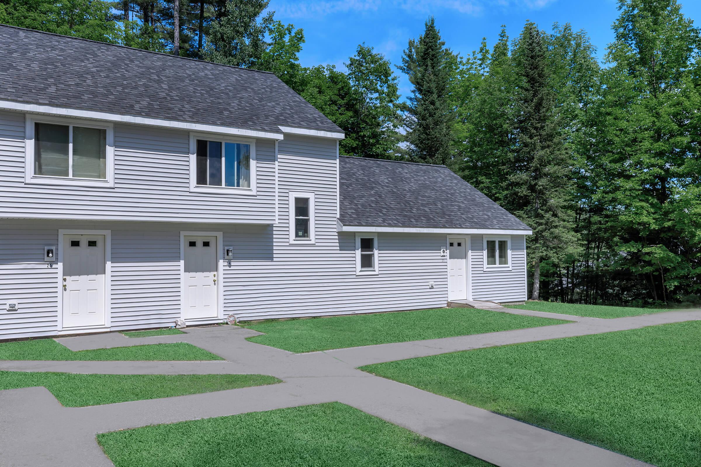 a large lawn in front of a house