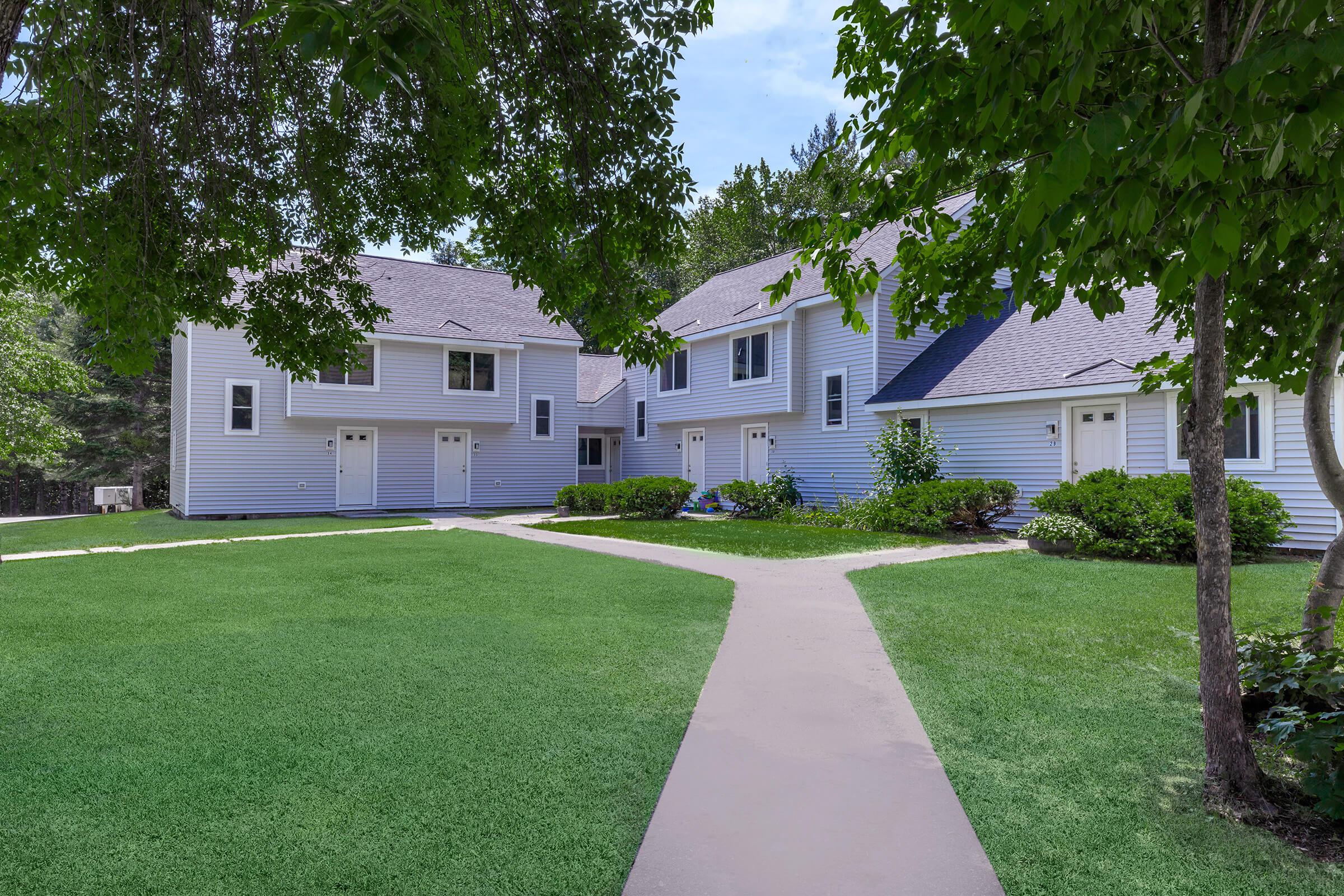 a large lawn in front of a house