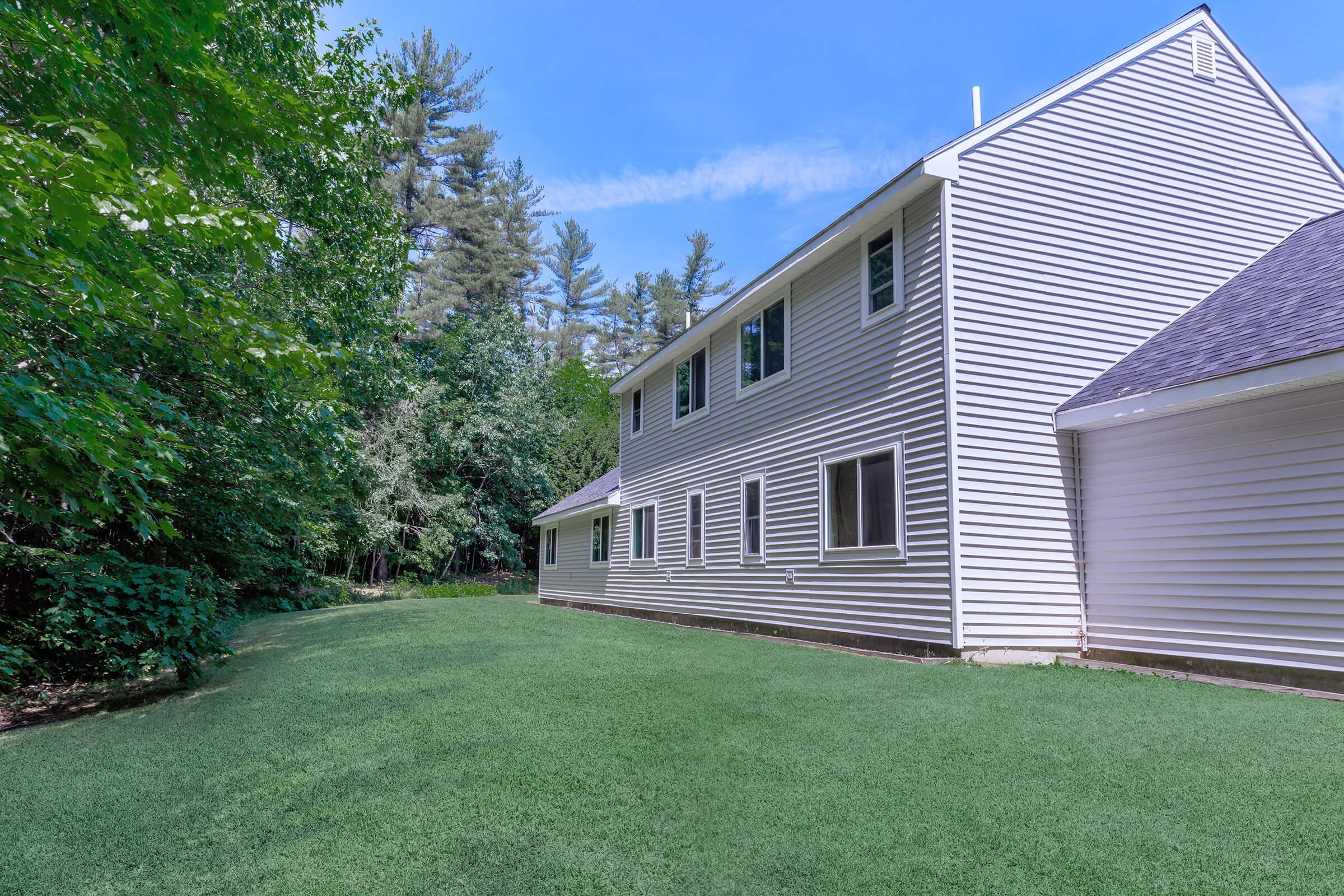 a large lawn in front of a house