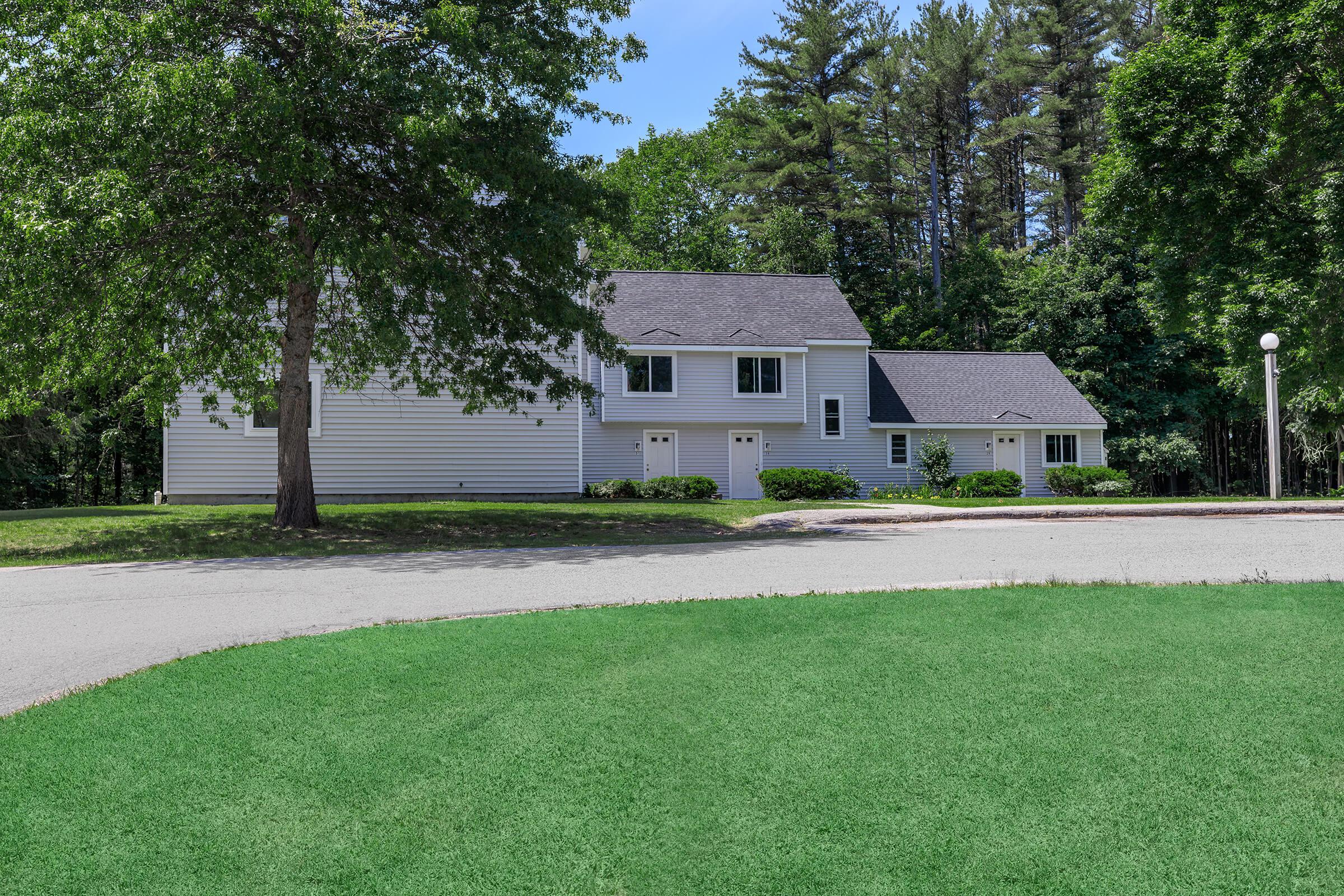 a large lawn in front of a house