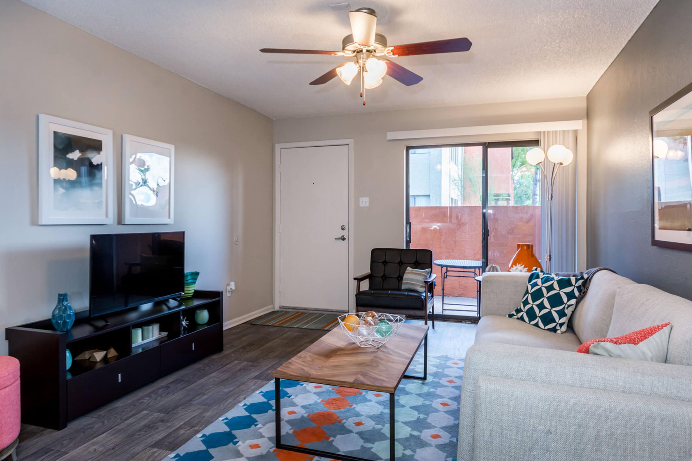 Living Room with Wood-style Flooring - Eden Apartments - Tempe - Arizona