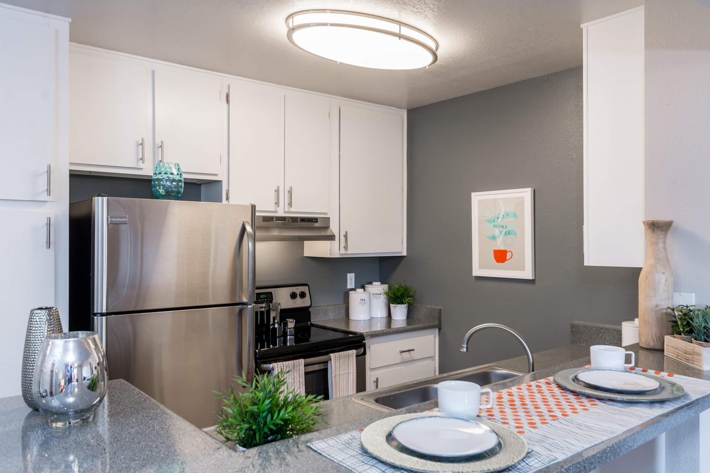 All-Electric kitchen with Stainless Steel Appliances - Eden Apartments - Tempe - Arizona