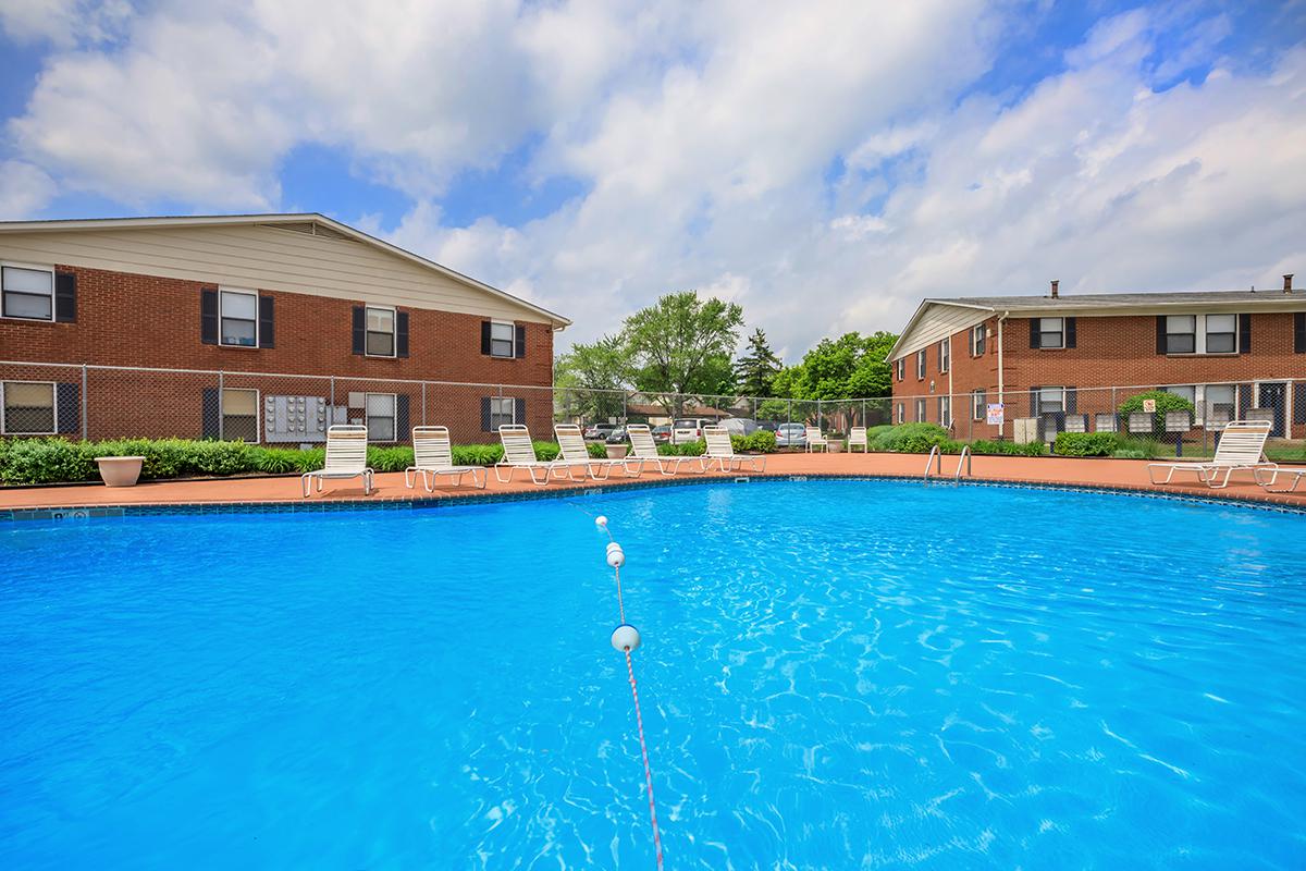 a house with a large pool of water