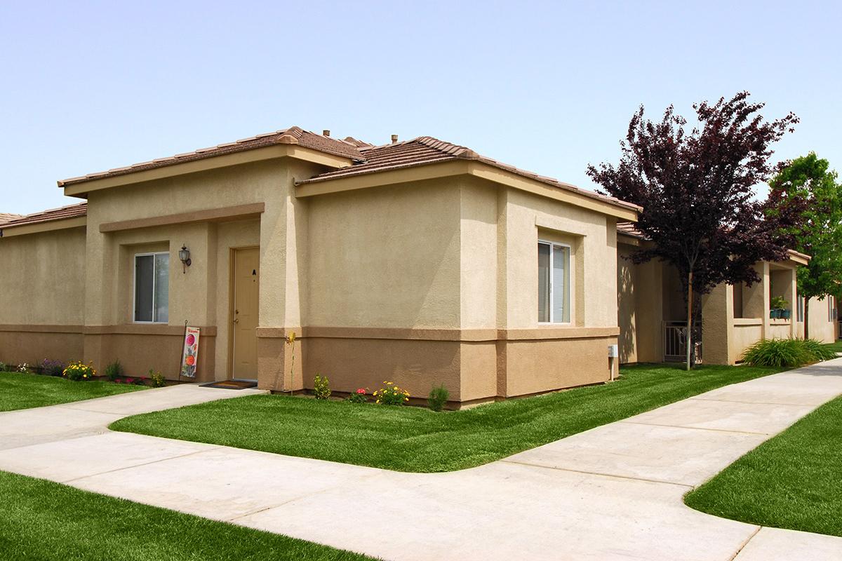 Community buildings with green grass