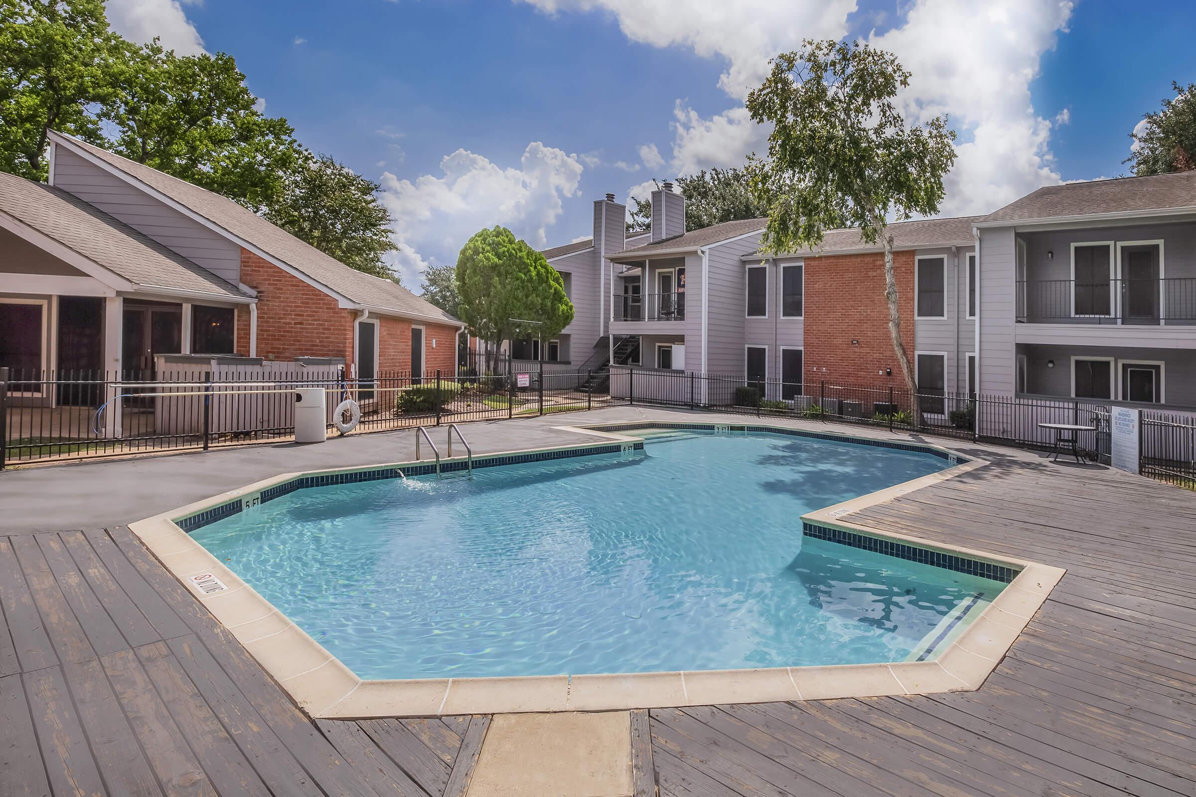 a house with a large pool of water