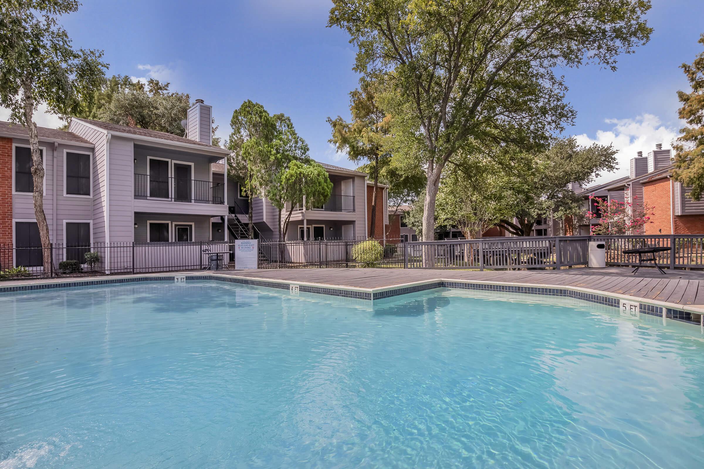 a house with a large pool of water