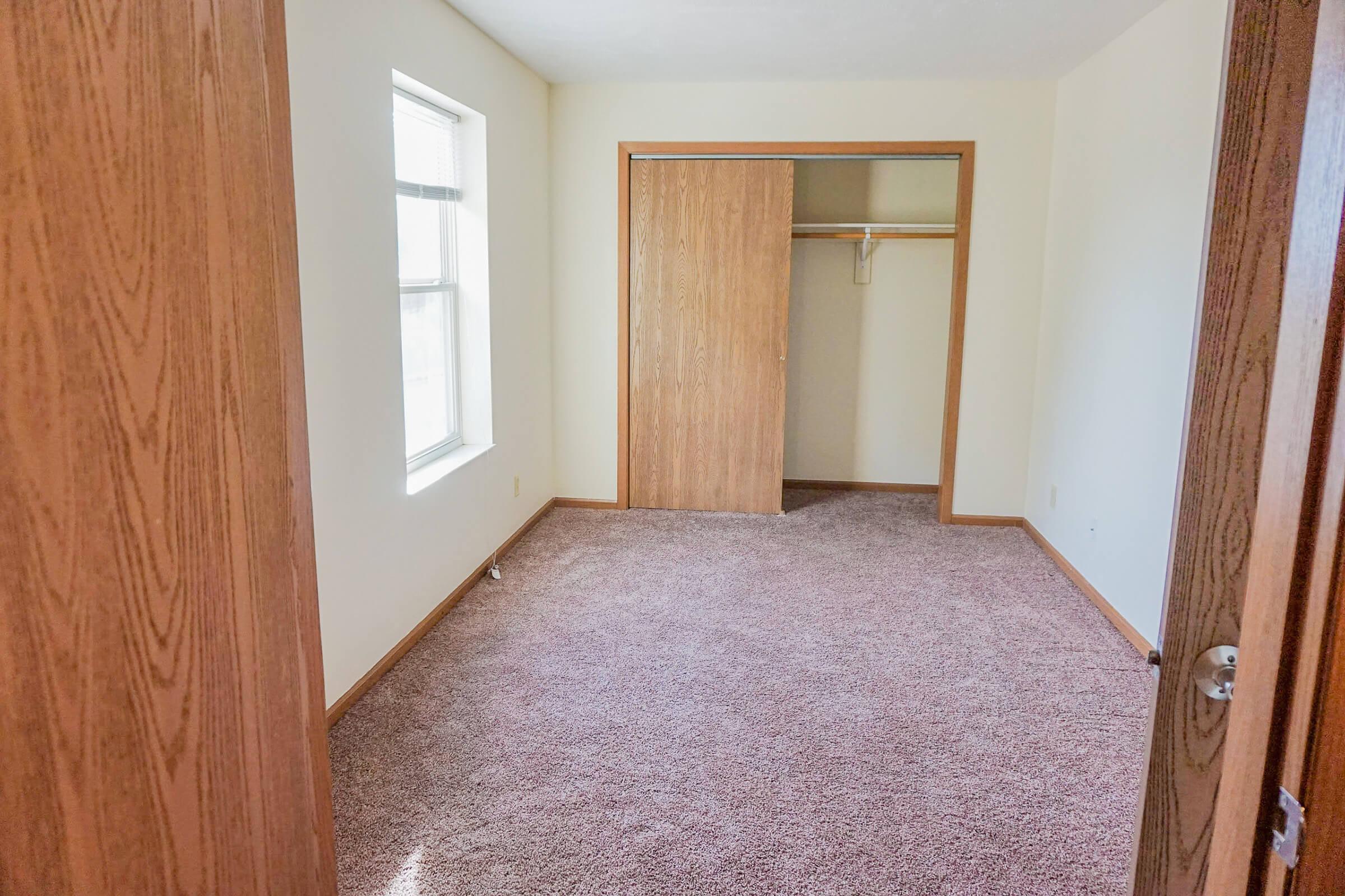 a wooden door in a room