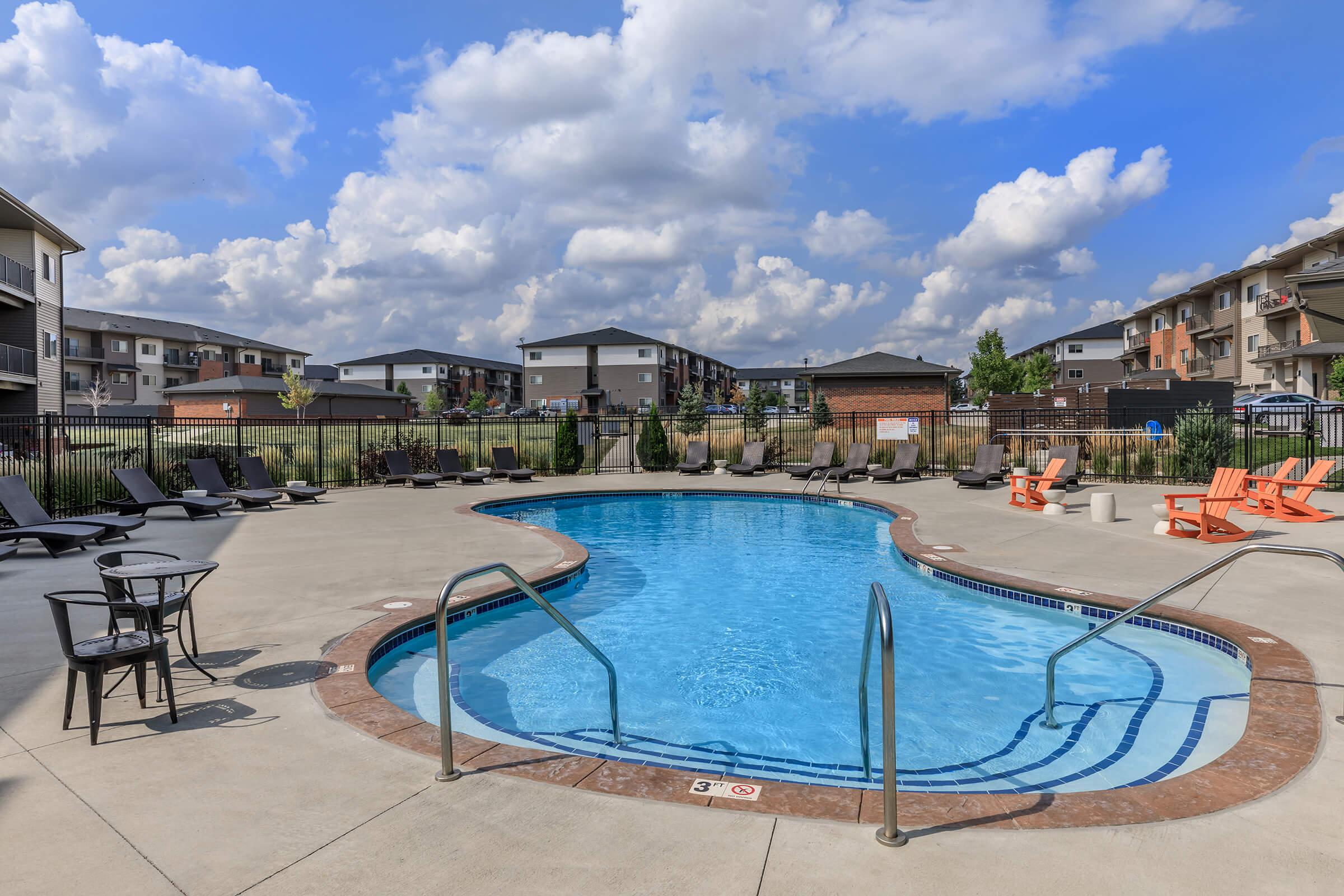 a pool next to a body of water