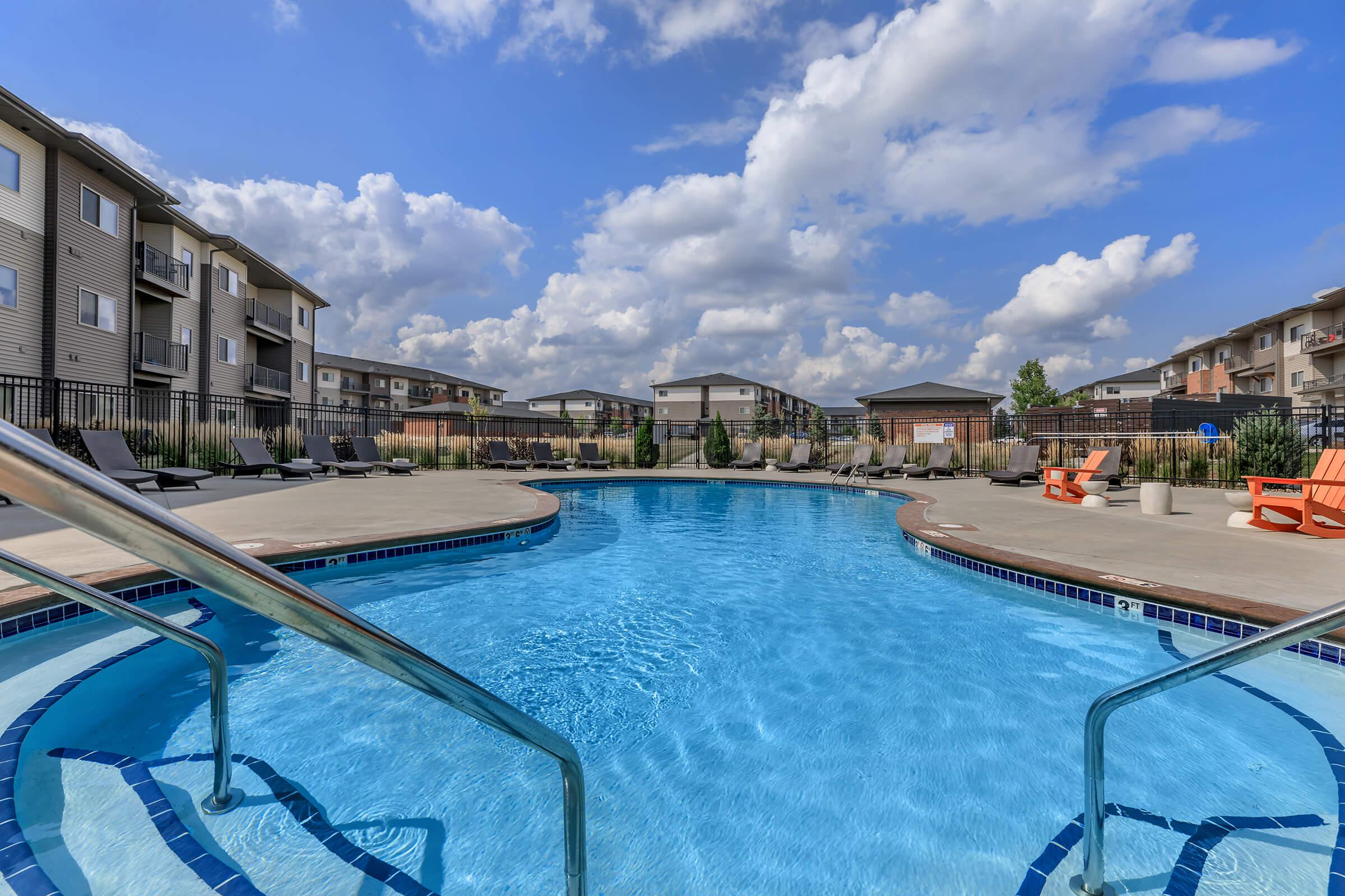 a pool next to a body of water