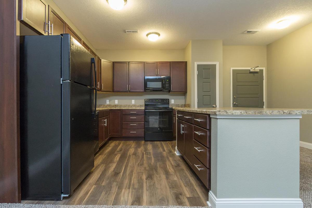 a modern kitchen with stainless steel appliances