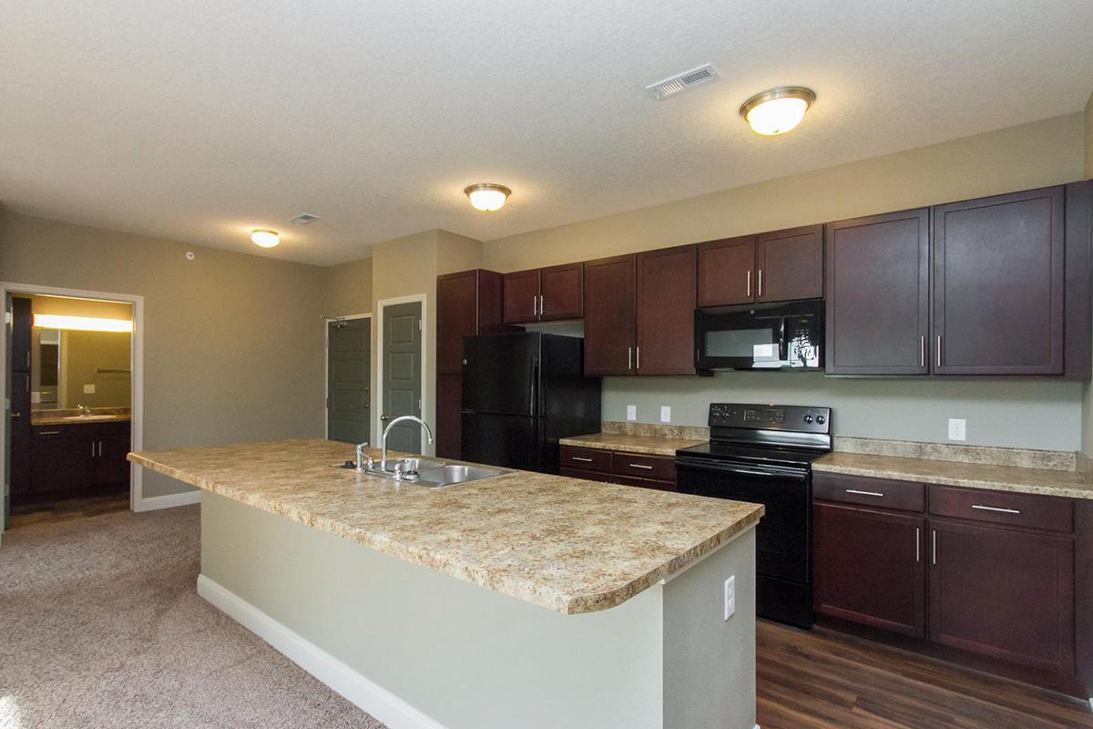 a modern kitchen with stainless steel appliances