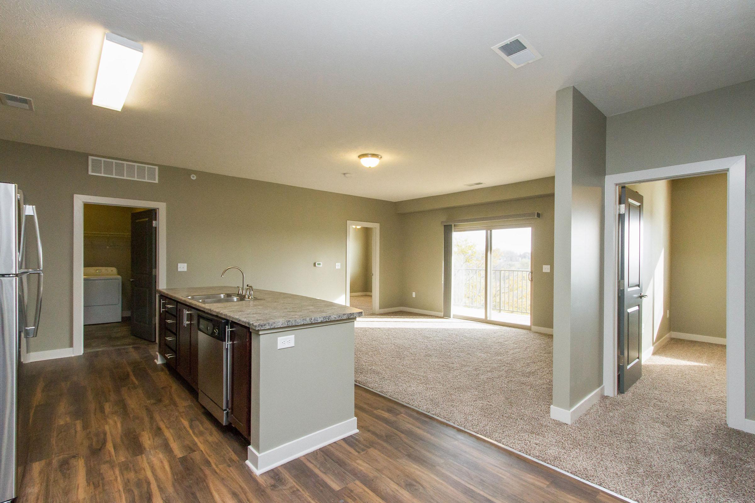 a large kitchen with stainless steel appliances