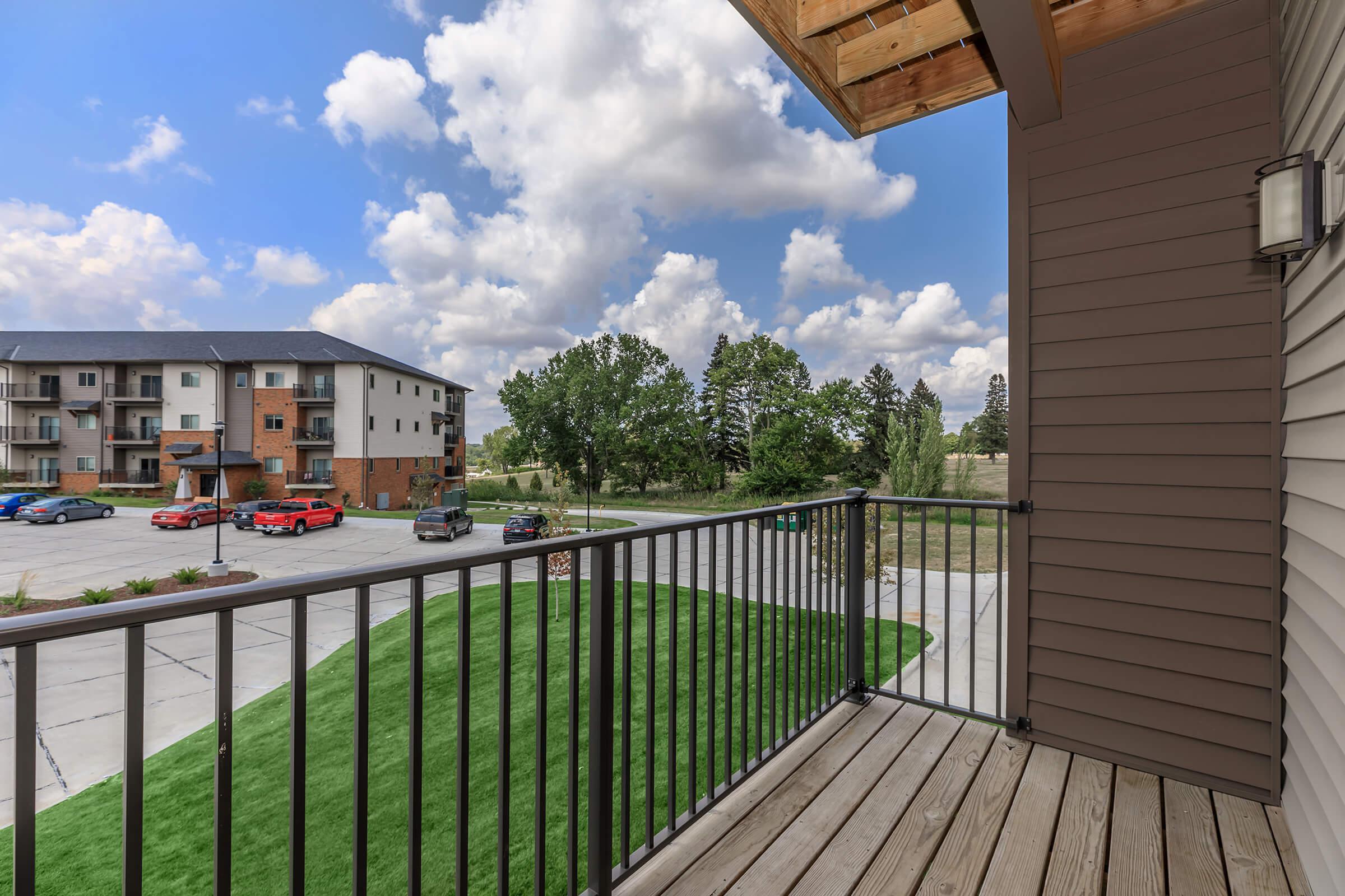 a building with a wooden fence