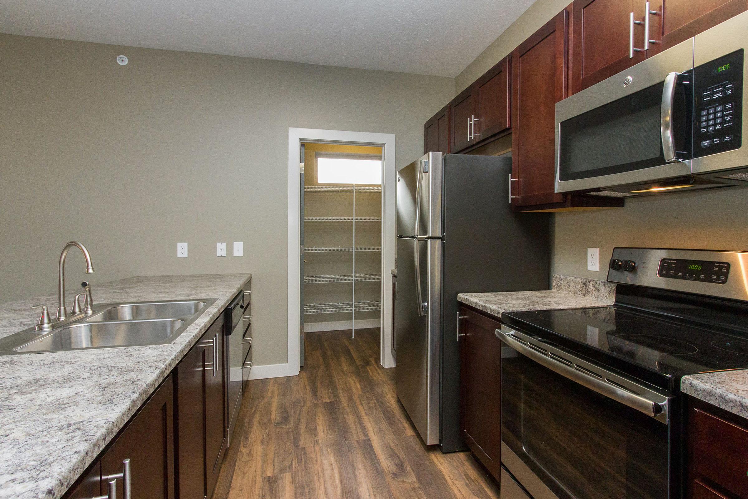 a modern kitchen with stainless steel appliances