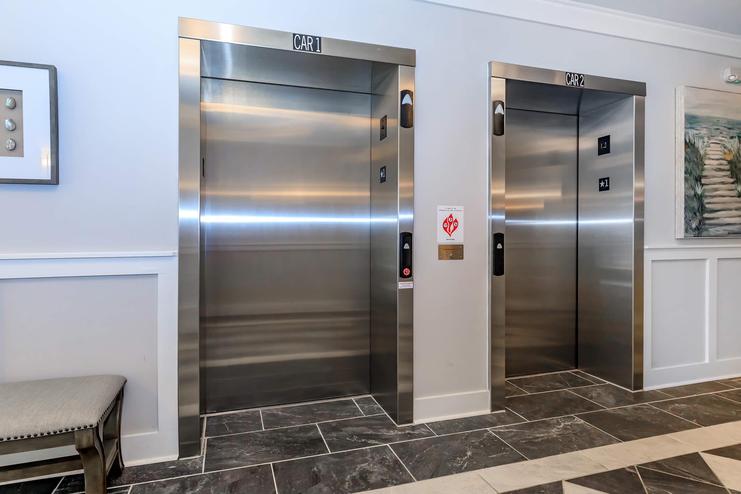 a stainless steel refrigerator in a room